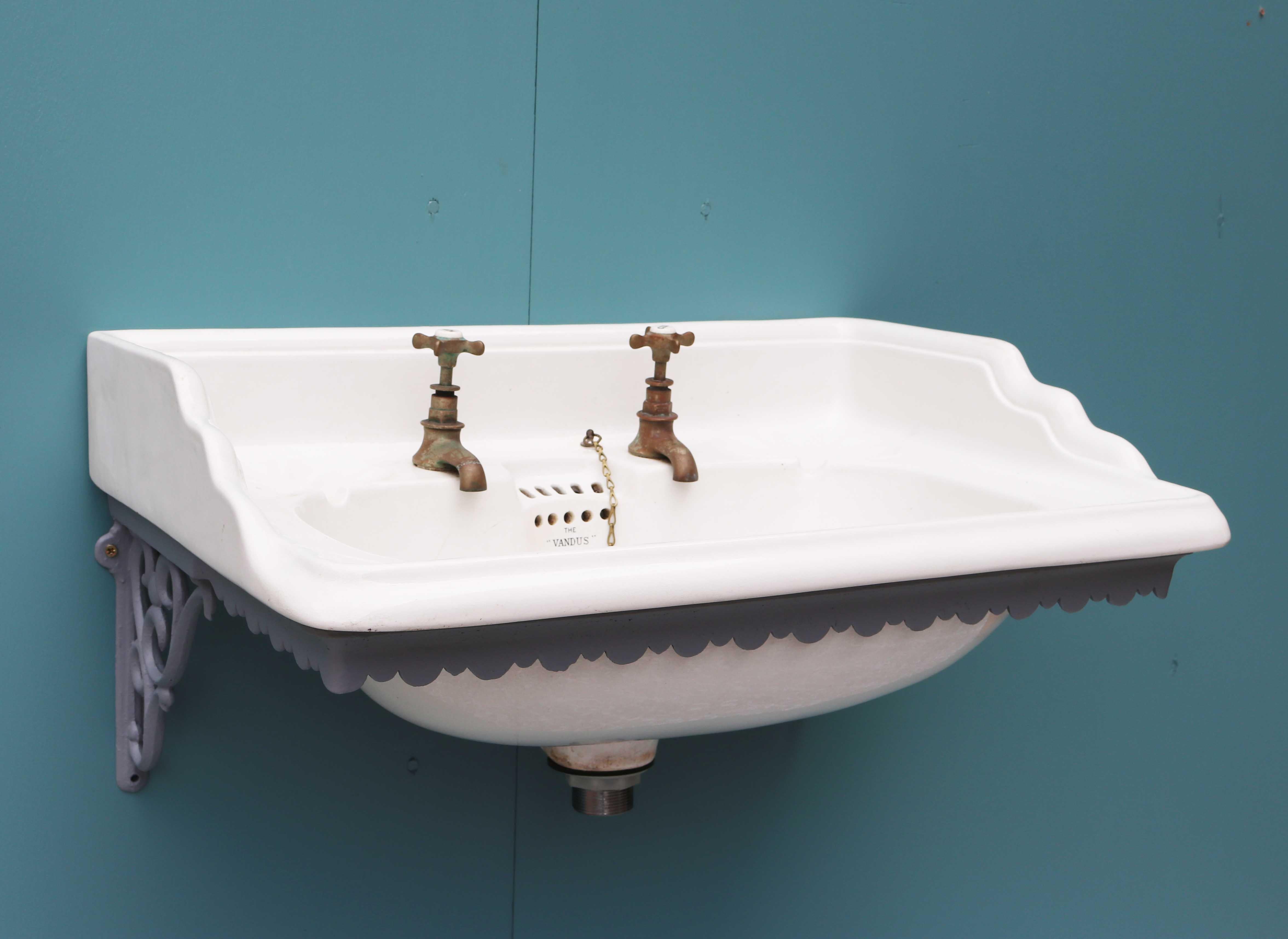 About

A Victorian wall-mounted ‘Vandus’ basin. with cast iron bracket. The basin has original taps and is fitted with a plug, chain and waste. 

Condition report

The taps turn freely, however are not tested. No chips. There are small areas
