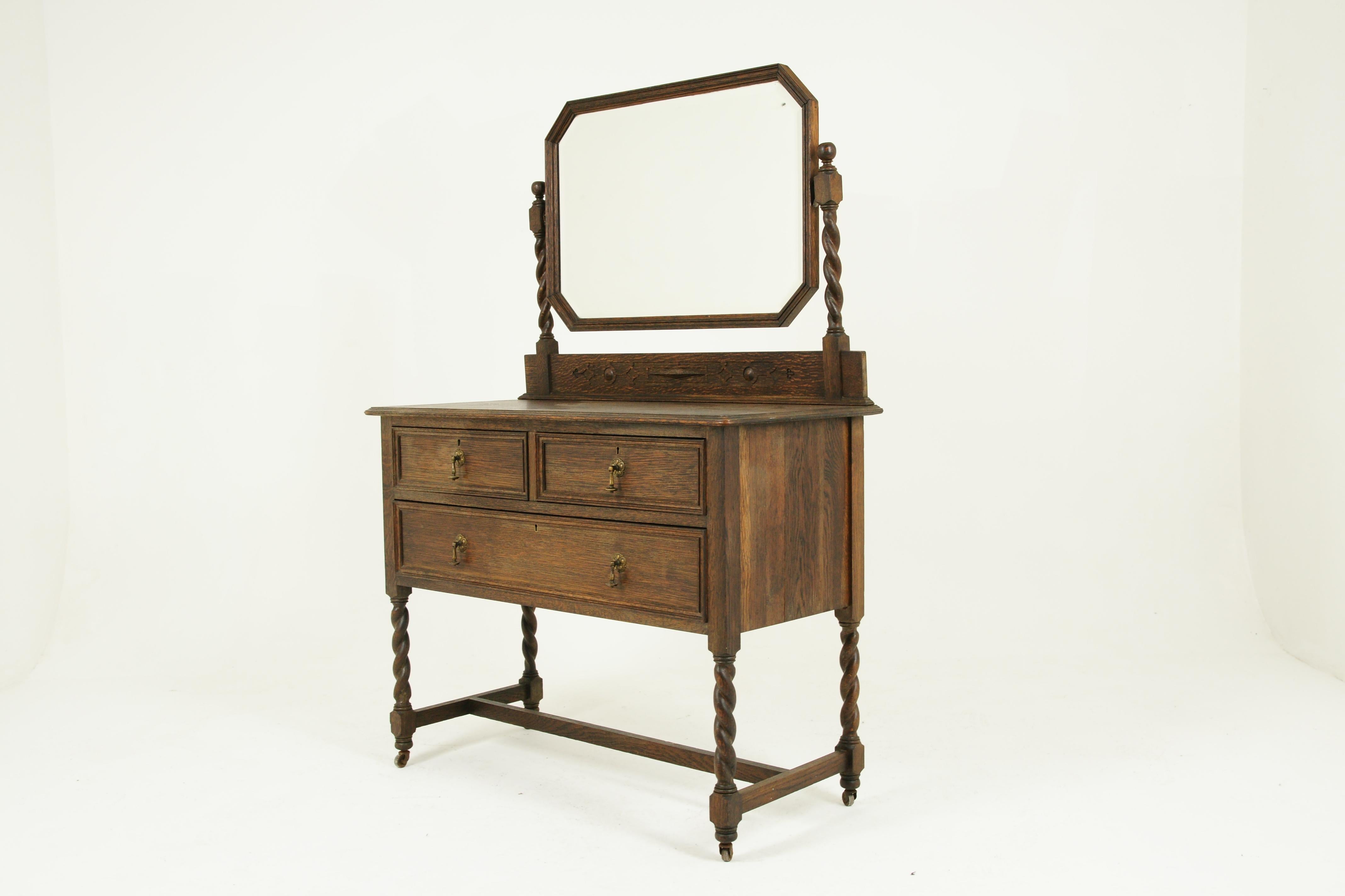 Antique vanity, antique oak dresser, Jacobean revival, tiger oak, Scotland 1910, antique furniture, B1335A

Scotland 1910
Solid oak
Original finish
Heavy beveled mirror
Supported by a pair of barley twist support posts
Carved gallery
