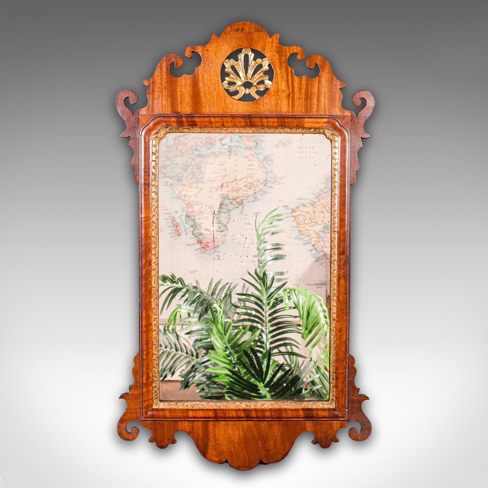 
This is an antique vanity mirror. An English, mahogany and glass hall, bedroom or morning room mirror, dating to the Georgian period, circa 1780.

Appealingly presented Georgian mirror, with a striking show frame
Displays a desirable aged patina