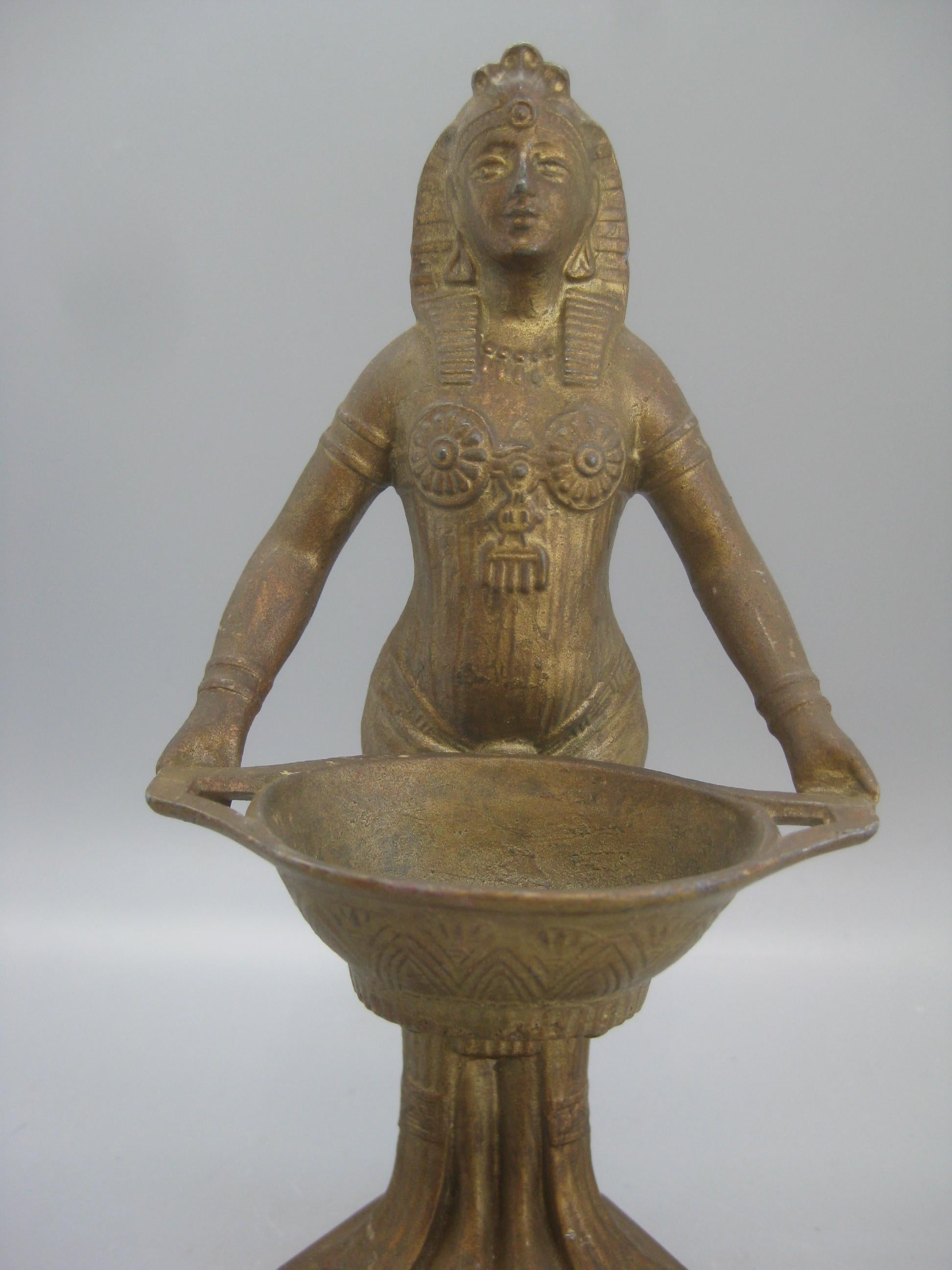 Great French Art Deco Egyptian Revival figural statue incense burner dating from the 1930s. Made by Vantines of France and is signed on the underside of the incense holder. Made of spelter metal and has a bronze cold paint finish. Wonderful details