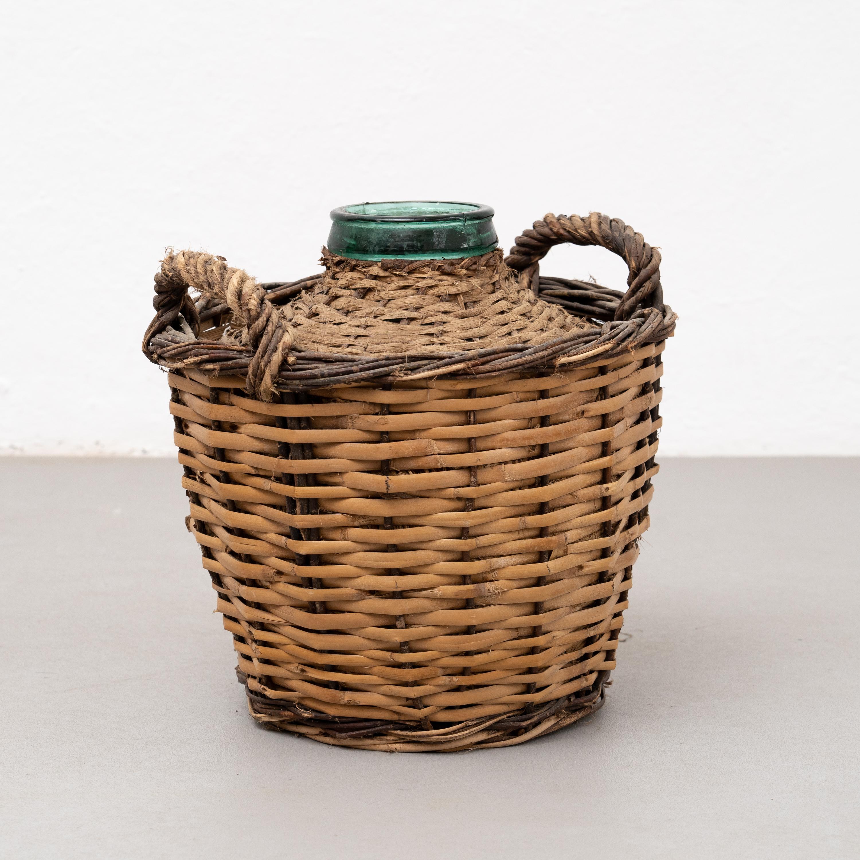Antique vase with wicker basket.

By unknown artist, circa 1960.

In original condition, with some visible signs of previous use and age, preserving a beautiful patina.

Materials:
Glass.
Wicker.
  