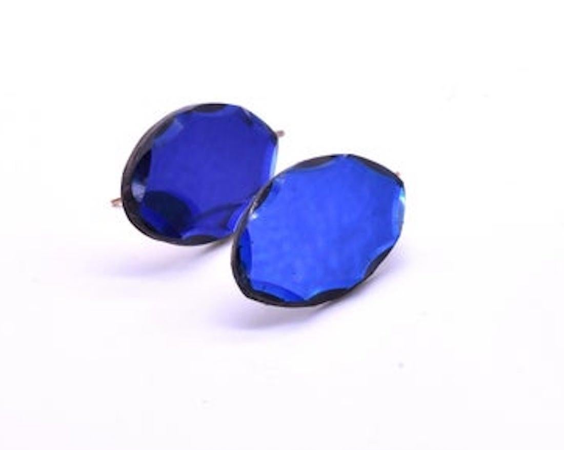 Brilliant early Victorian deep cobalt blue Vauxhall glass oval earrings. Vauxhall glass jewelry was made from mirrored glass at the Vauxhall Glassworks in London from the 1700's through the mid 1800's and sold at the nearby Vauxhall Pleasure