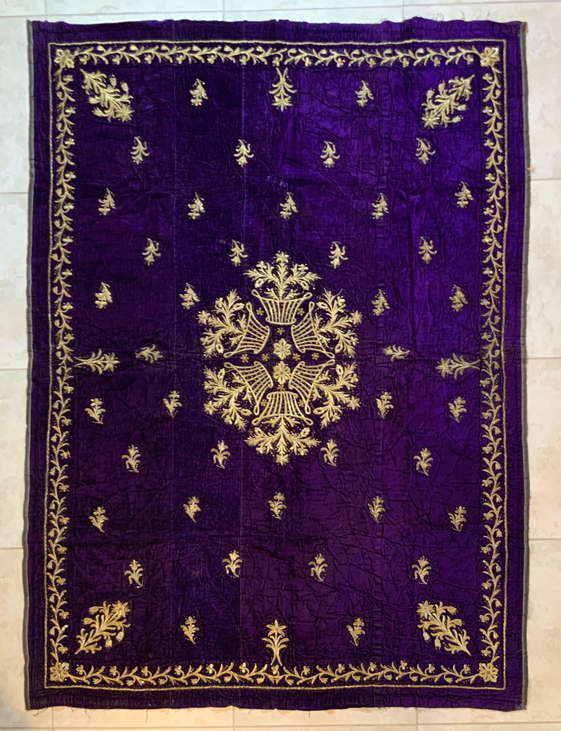 Exceptional textile made of purple color velvet, with beautiful intricate gold embroidery floral motifs, center medallion. Some minor velvet oxidization, few small rips, see photo.
Great object of antique art for display.