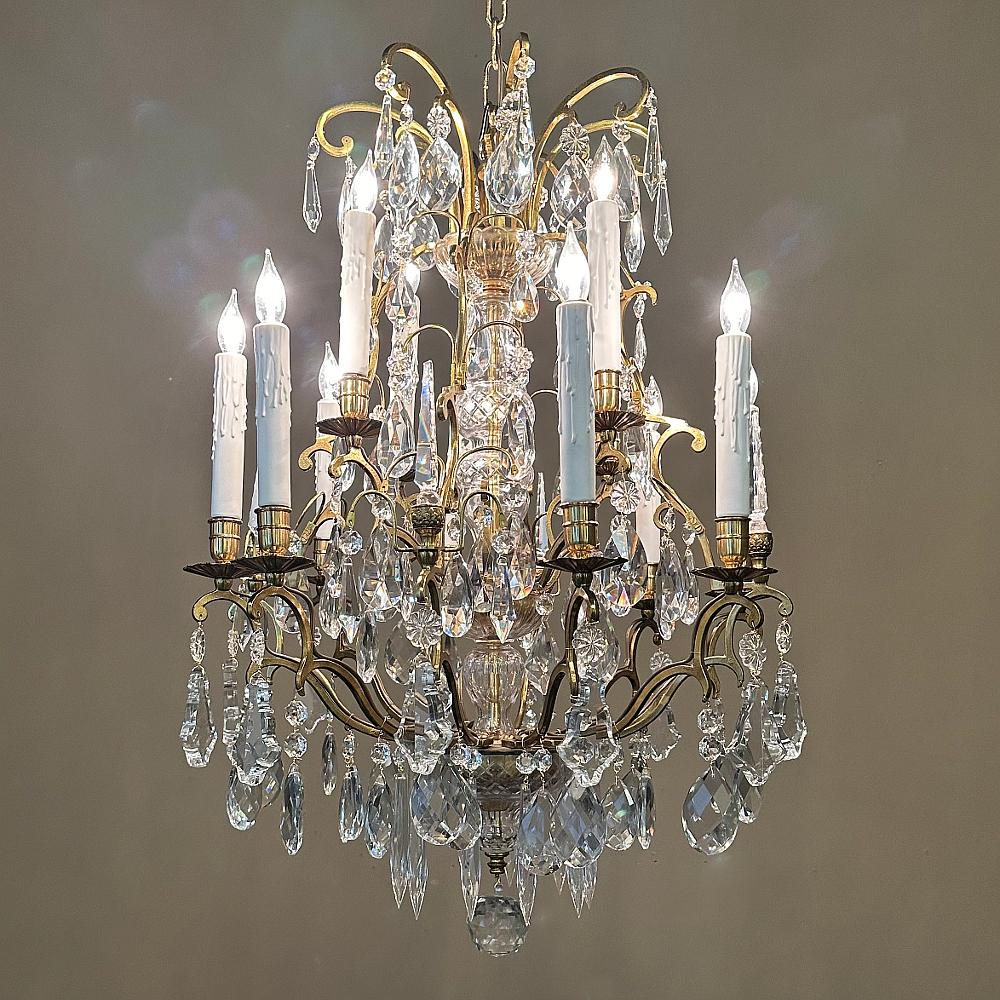 Antique Venetian Brass and Crystal Chandelier combines elegant styling with multi-faceted crystals of several shapes and sizes to create a visual feast for the eyes, even when it's not turned on!  Hand-crafted to a high degree of artistry, it