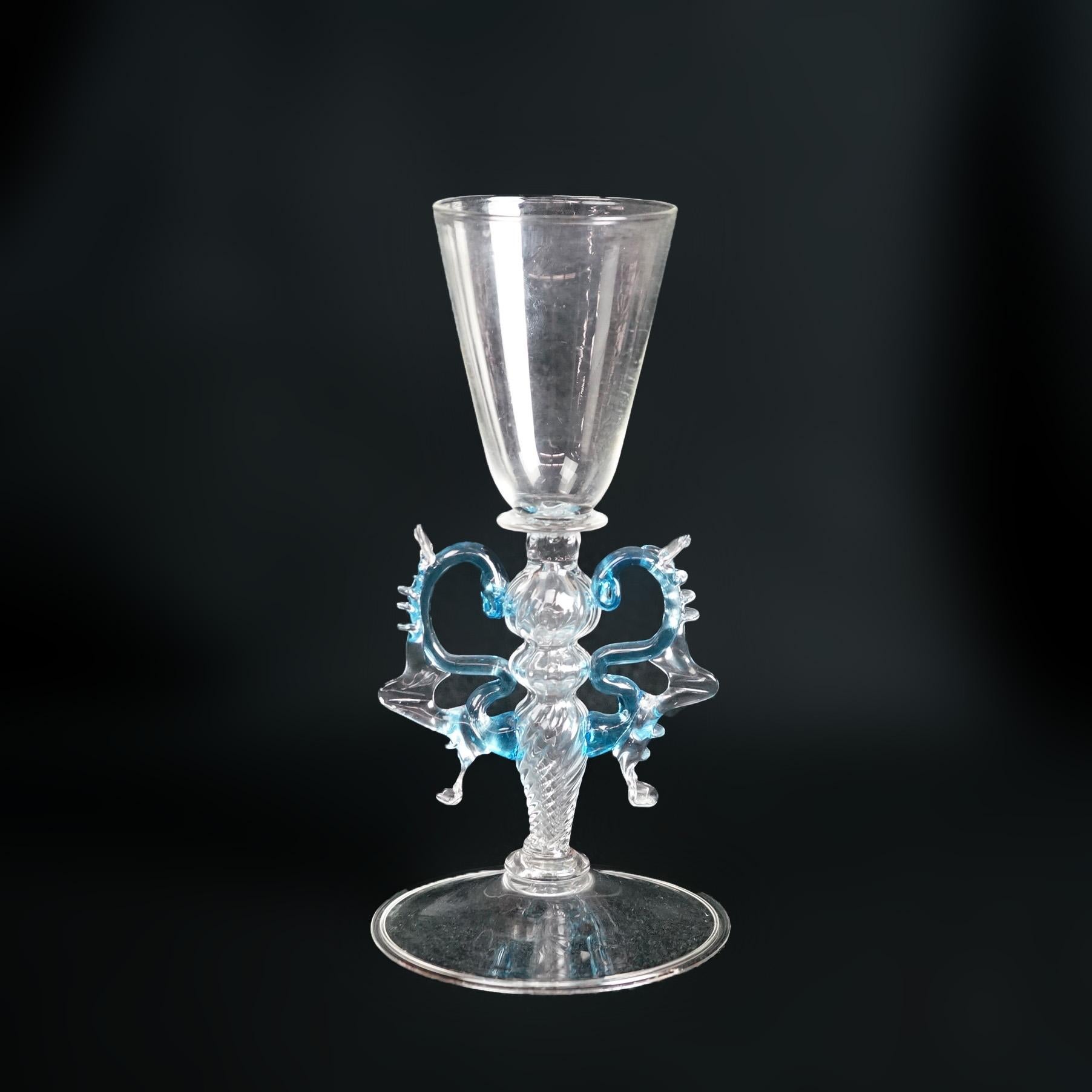 An antique figural Venetian style goblet by William Gudenrath offers art glass construction with flared cup over double stylized dragon pedestal, artist signed on base, c1920

Measures - 7