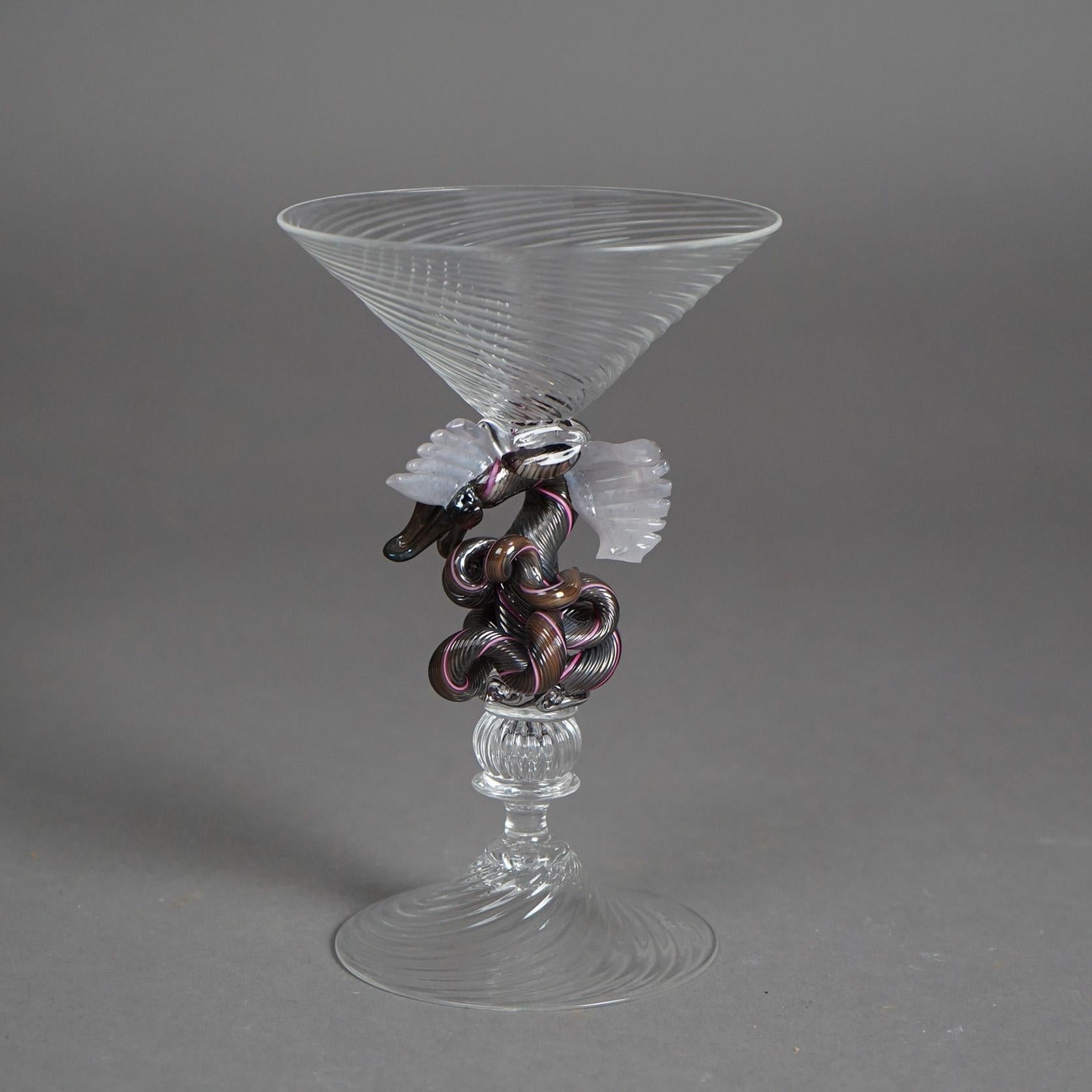 An antique figural Venetian style goblet by William Gudenrath offers art glass construction with flared cup over dragon pedestal, artist signed on base, c1920

Measures - 6.75