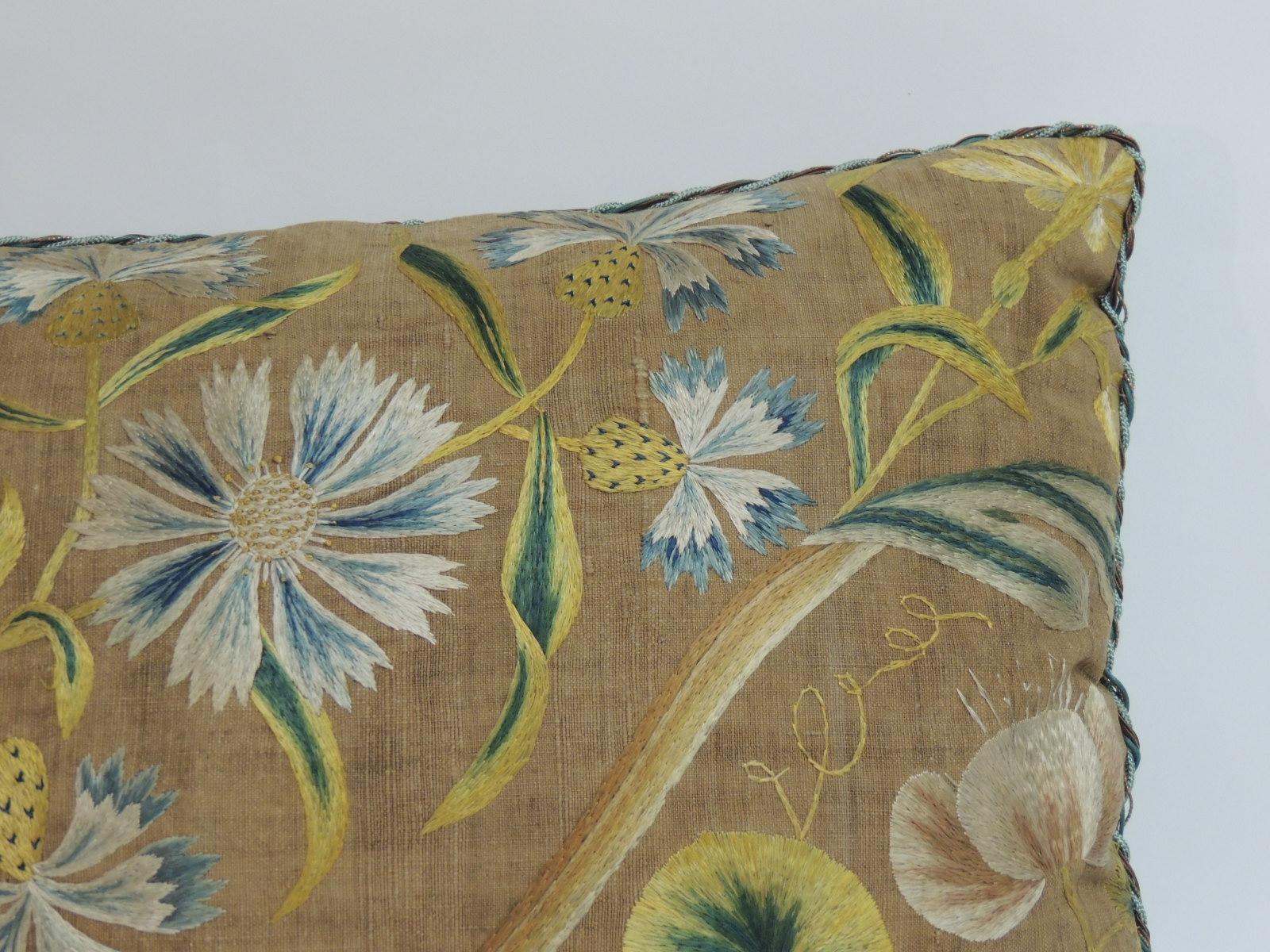 Antique Venetian floral embroidered large bolster decorative pillow. Italian floral silk floss thread embroidered on linen.
In shades of yellow, green, white, pink and blue. Silk green velvet backing and ATG decorative twisted trims all