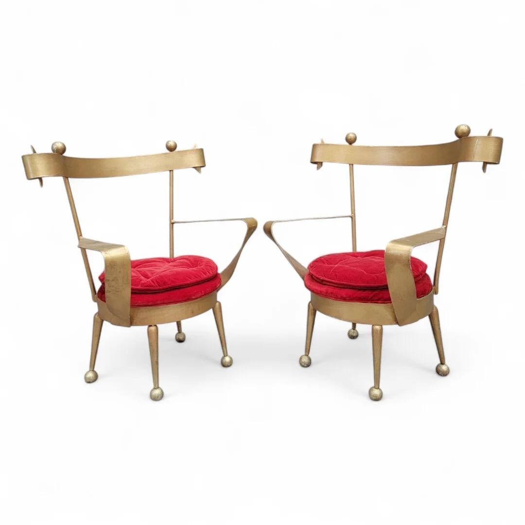 Antique Venetian Gold Forged Iron Vanity Chairs - Pair

The chairs feature a original red velvet upholstery that adds a touch of opulence, while the intricately forged iron frames highlight the artistry of Venetian design. Perfect for enhancing any