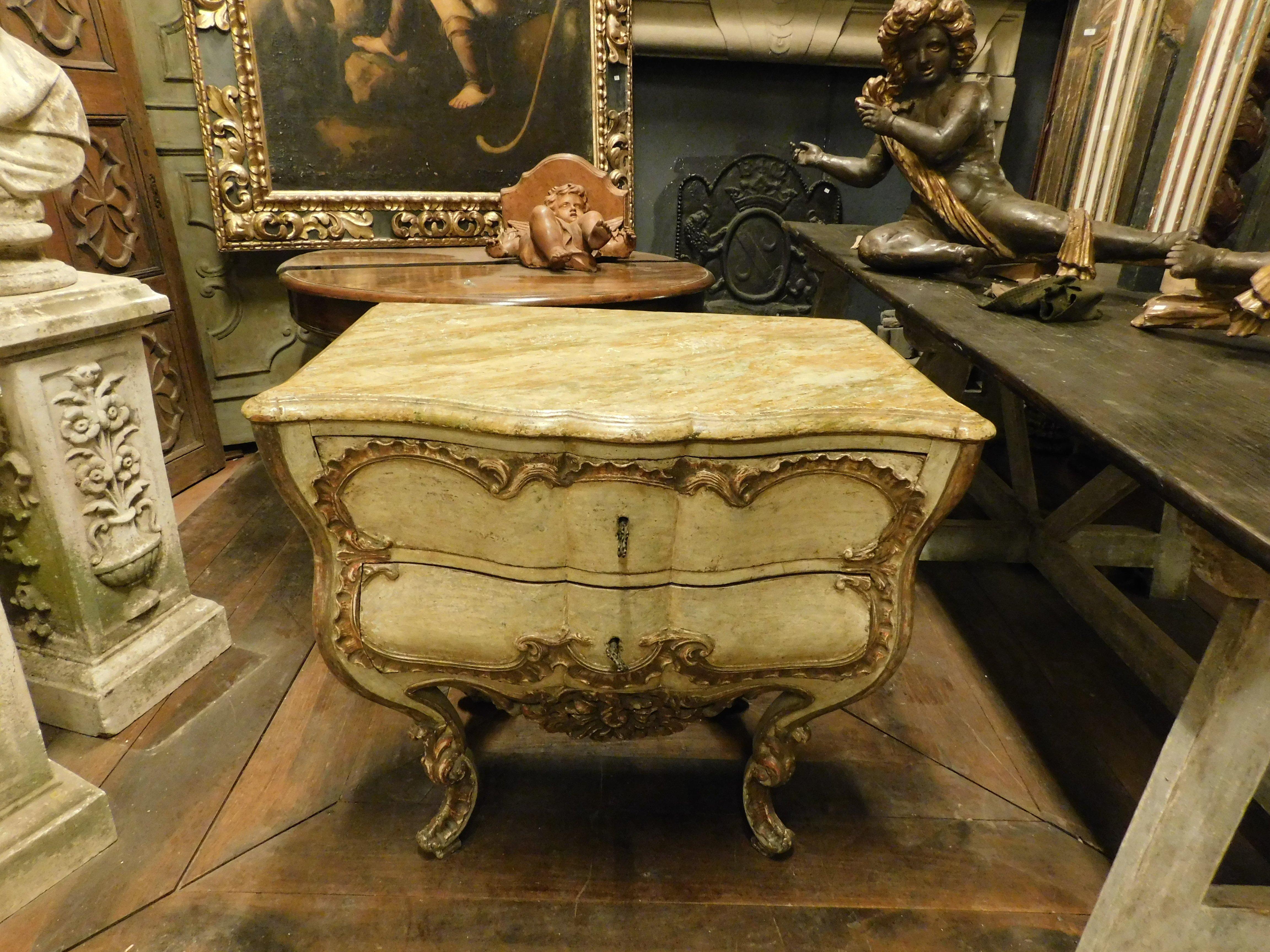 Italian Antique Venetian lacquered and gilded chest of drawers, richly carved, Italy For Sale