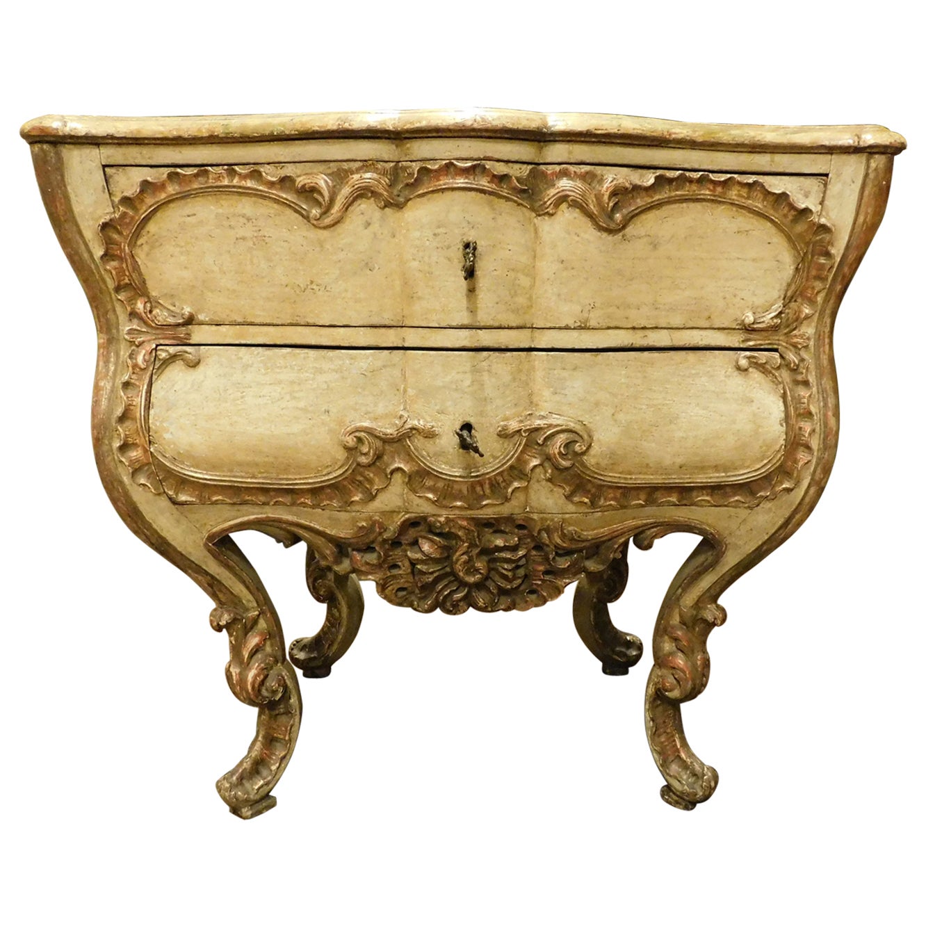 Antique Venetian lacquered and gilded chest of drawers, richly carved, Italy