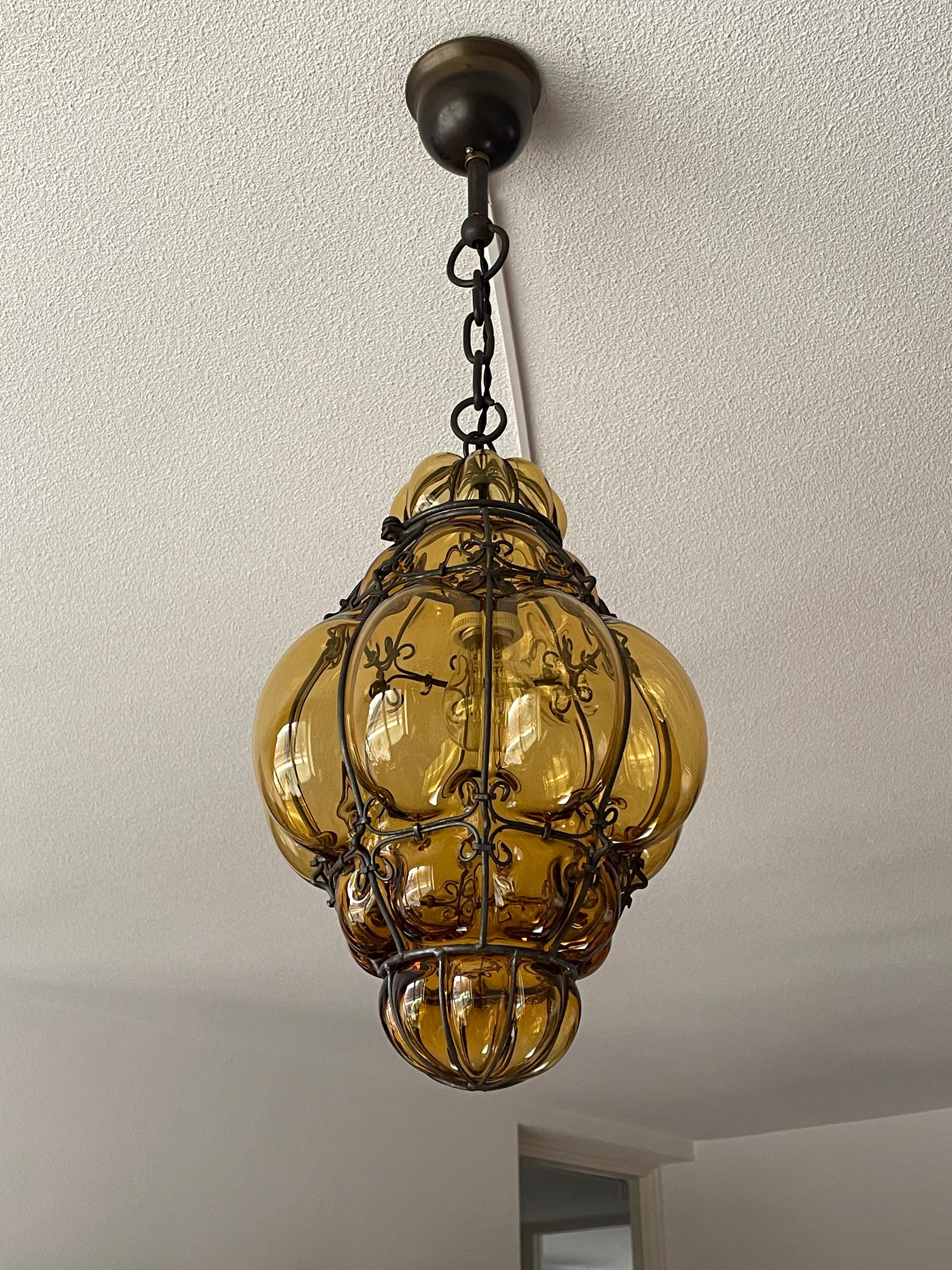20th Century Antique Venetian Murano Pendant Light Mouthblown Glass into a Wrought Iron Frame For Sale