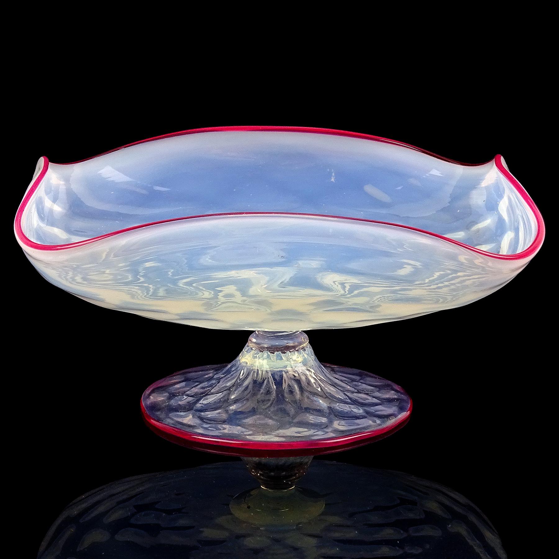 Beautiful antique Venetian, early Murano hand blown white opalescent with dark pink edge Italian art glass quilted footed bowl. Attributed to the Salviati company. The bowl has a squared shape, with folded up sides, and diamond quilted pattern