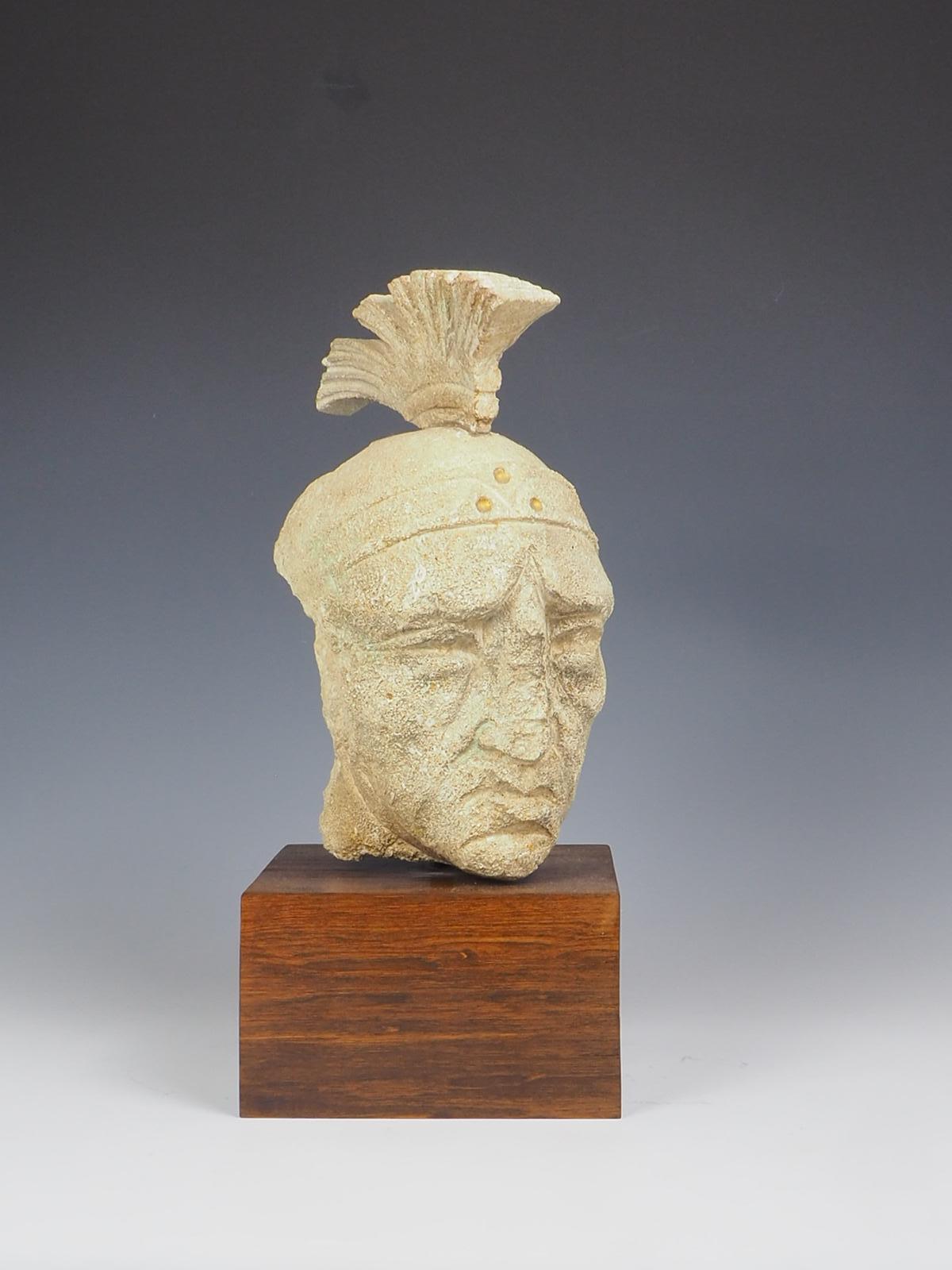 Antique Venetian Sandstone Head of a Roman Gladiator is a captivating piece of art that showcases the exquisite craftsmanship of the Venetian artisans. This stunning sculpture depicts the head of a Roman gladiator, capturing the strength and