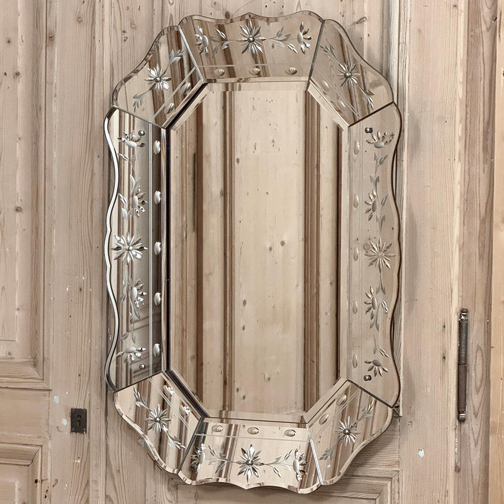 Antique Venetian Wall Mirror with Mirrored Frame hails from the region in Europe famously known for its glass works for centuries.  This example continues the traditions with a pleasingly contoured framework set at a slight angle out from the main