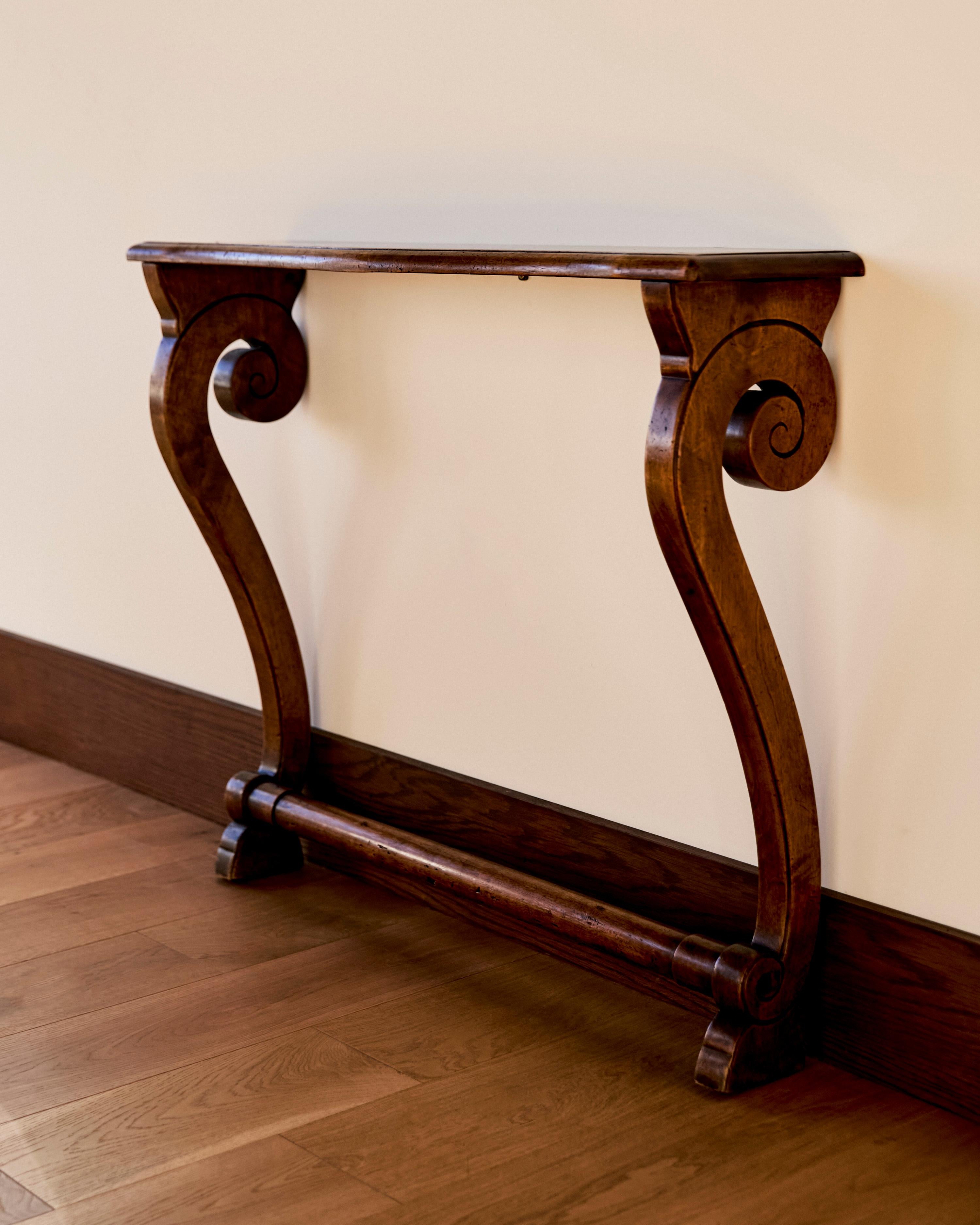 Antique Venetian wooden scroll wall console. 