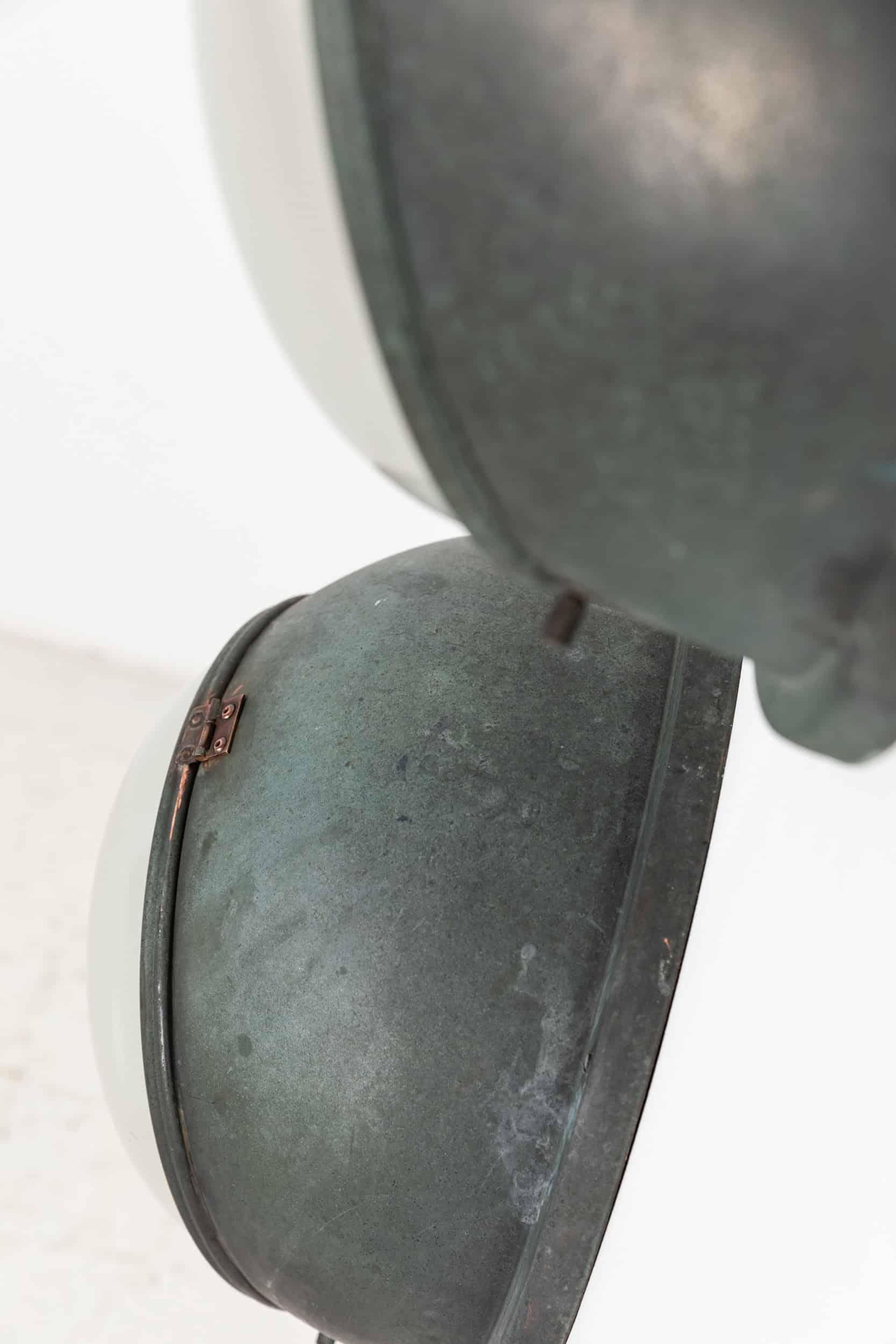 A pair of incredibly rare French Metro bulkhead lights, made by Holophane. c.1920.

Originally used to illuminate the tunnels and walkways of the French Metro system in and around Paris, these elliptical bulkhead lights have survived in beautiful