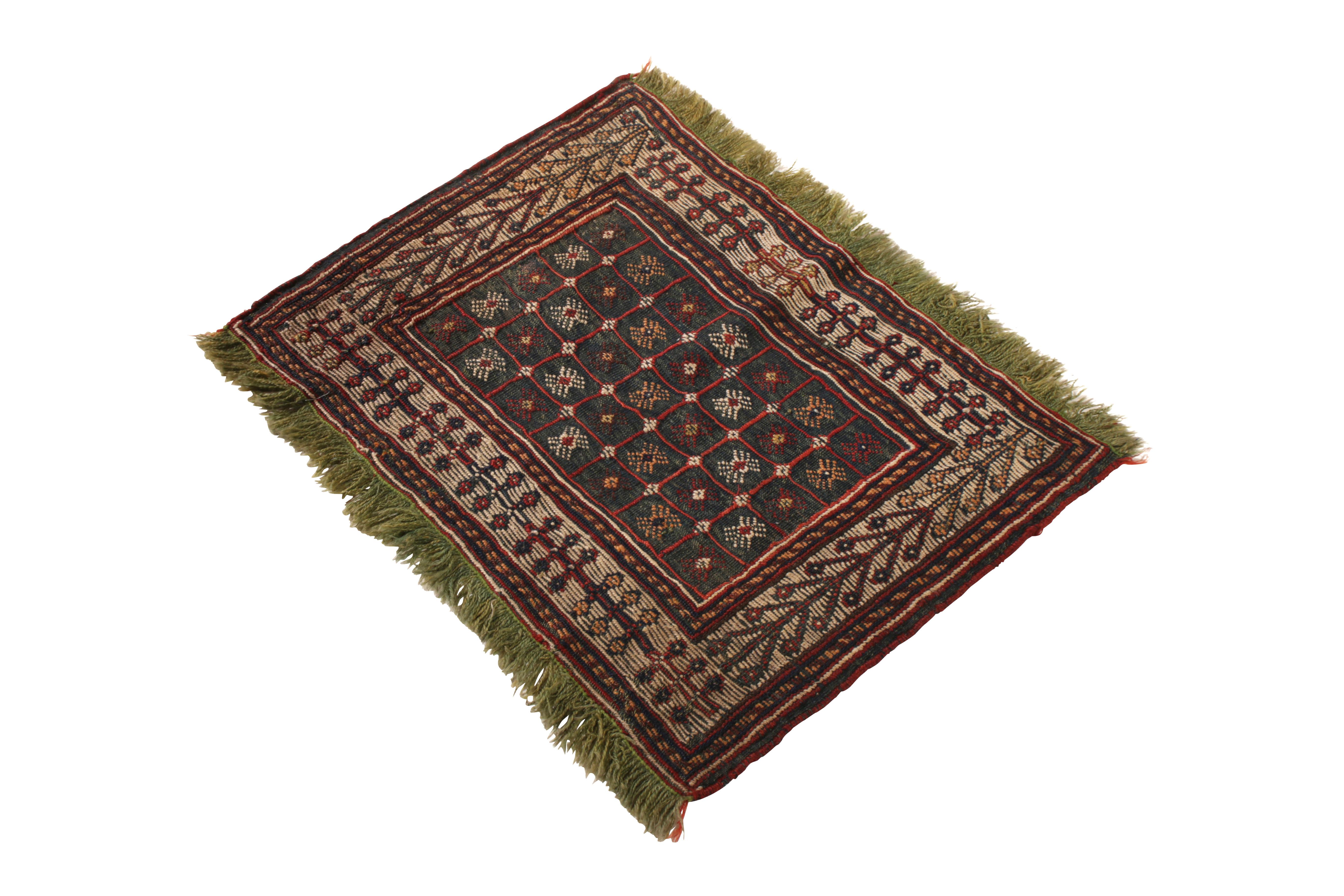 Originating from Turkey in 1910, this antique Verneh wool kilim rug employs several unique features in its field design, fringe structure, and colorway combination. Flat-woven in high quality wool, the tile pattern of the all over field design