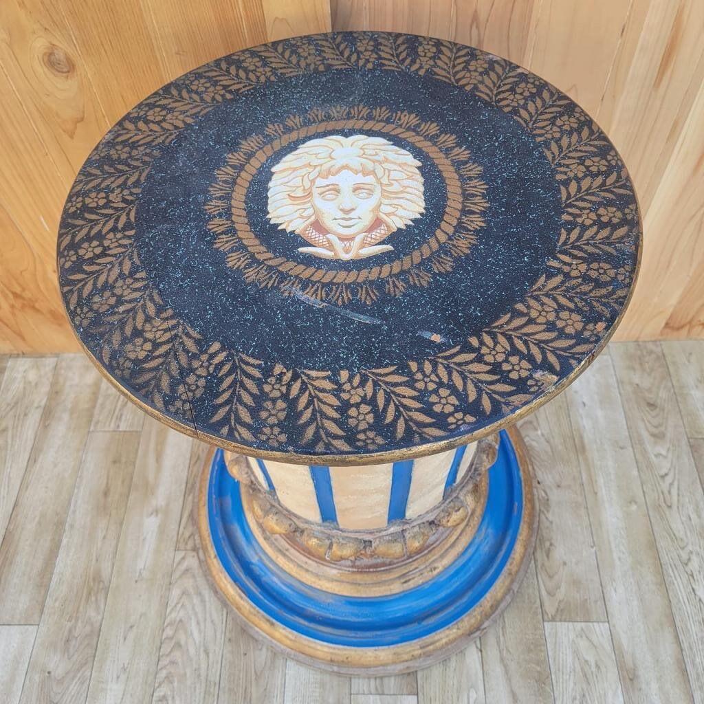 Antique Versace style hand-painted gold and blue medusa head pedestal/table.

This Antique Versace Style Hand-Painted Gold and Blue Medusa Head Pedestal is painted in gold, blues and whites with a Versace-Like Medusa head in the center of the top.
