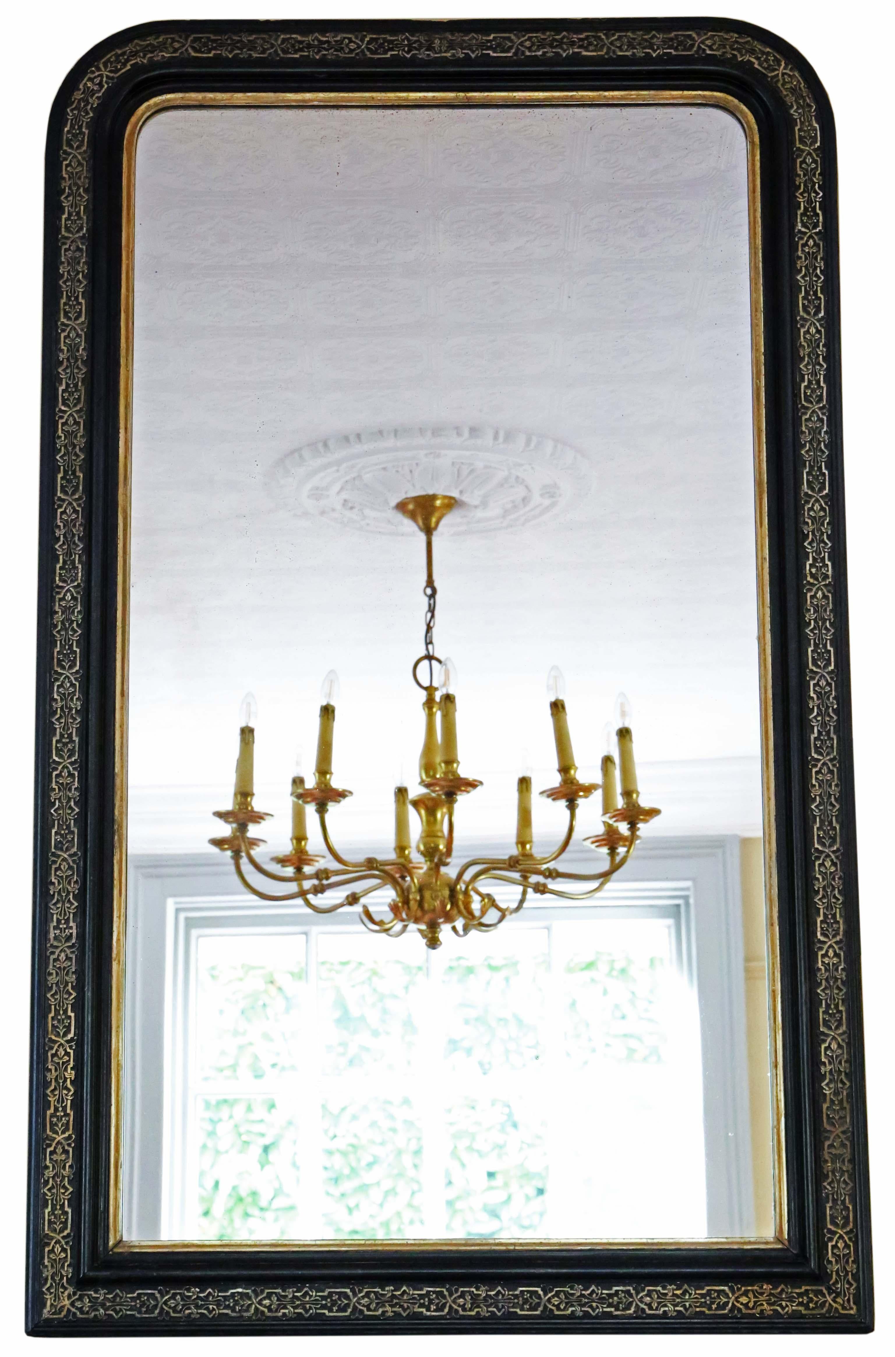 Antique very large 19th Century quality ebonised and gilt overmantle wall mirror. Lovely charm and elegance.

This is a lovely, rare mirror. A bit different and quite special.

An impressive find, that would look amazing in the right location. No