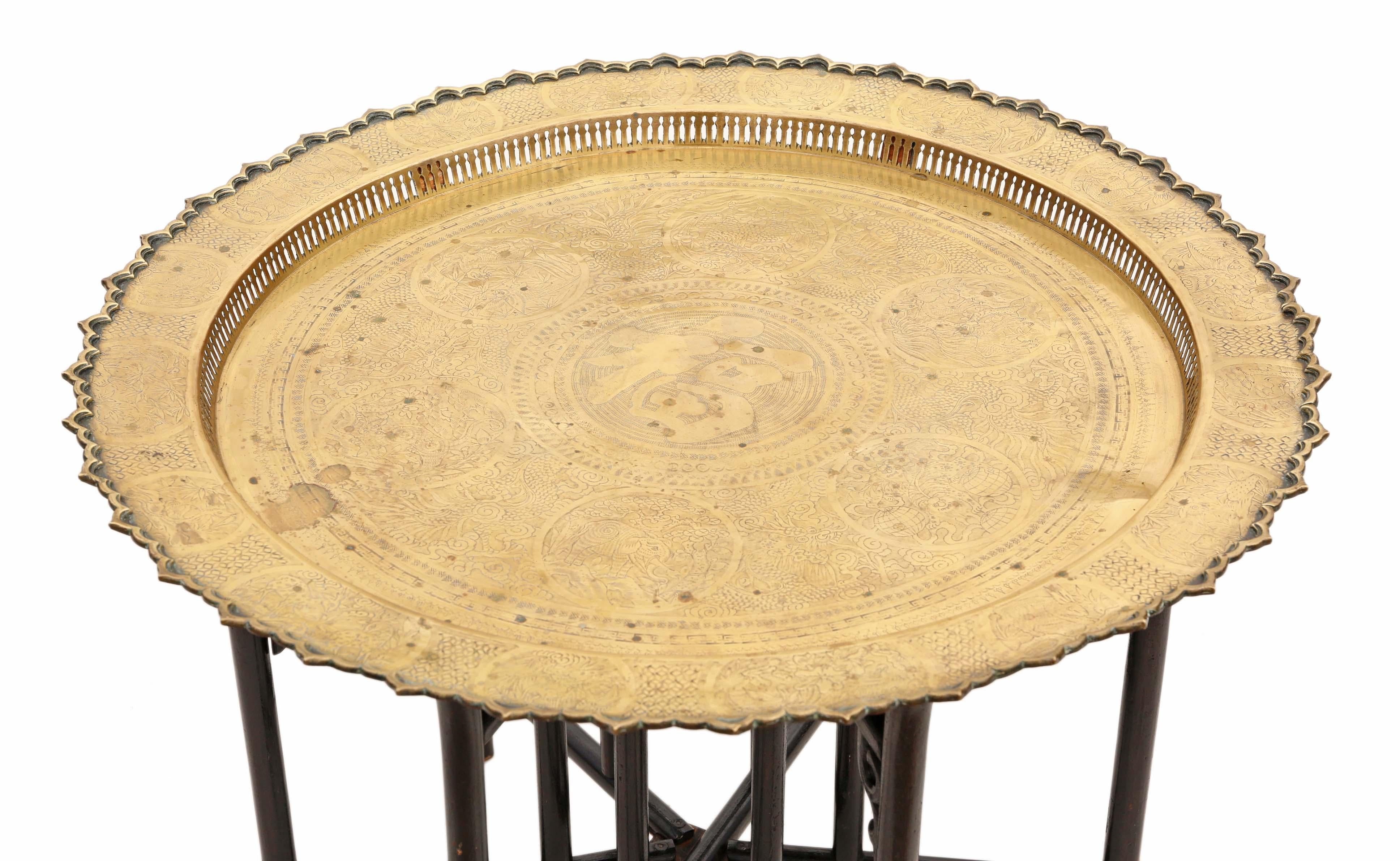 Antique quality very large oriental (Chinese / Japanese) brass tray charger on ebonised stand coffee table C1920.
 
Would make a great coffee table. Solid, no loose joints.
A great quality tray.

Very attractive, with lovely proportions and