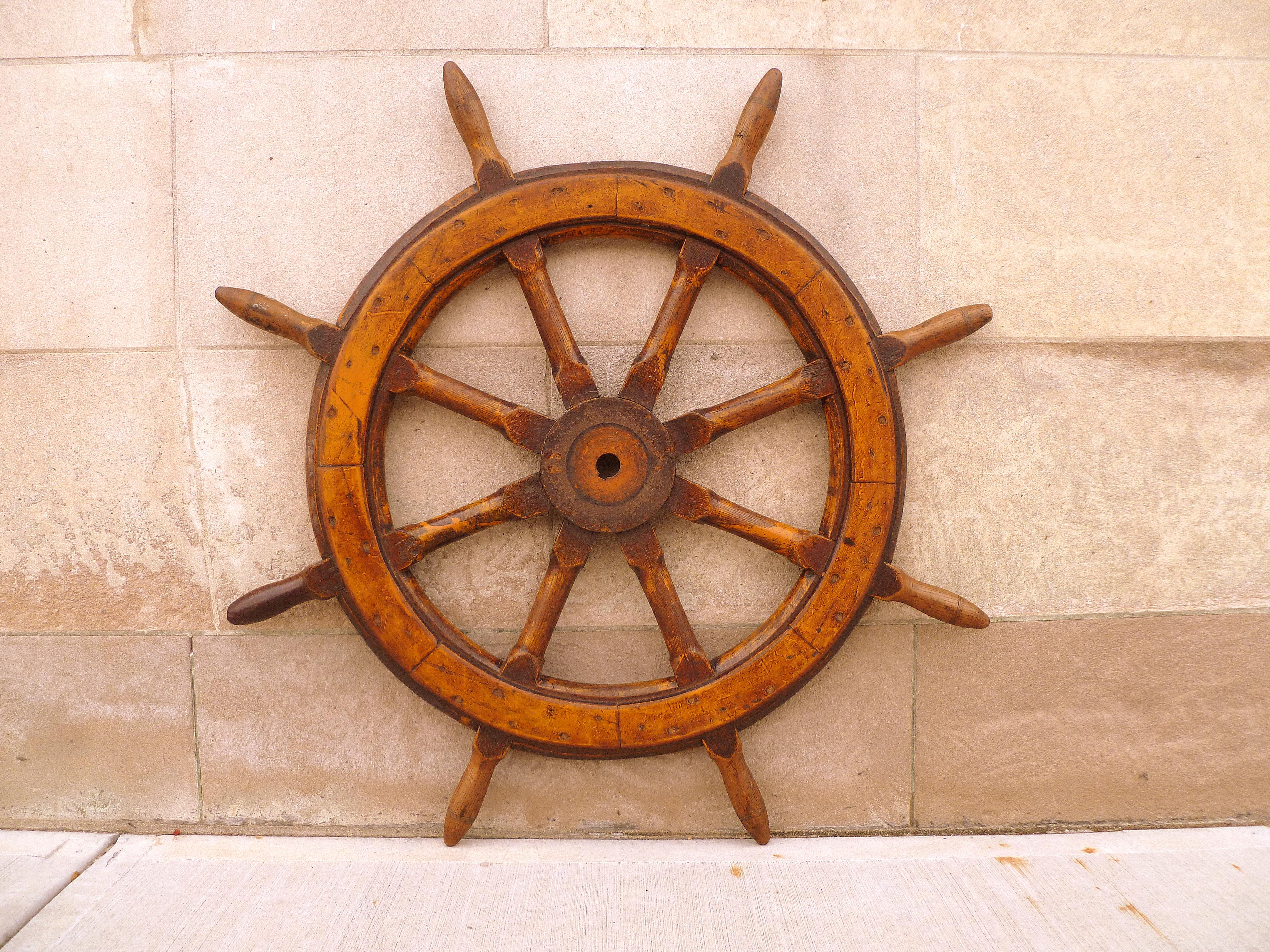 Antique ship vessel handle wheel.