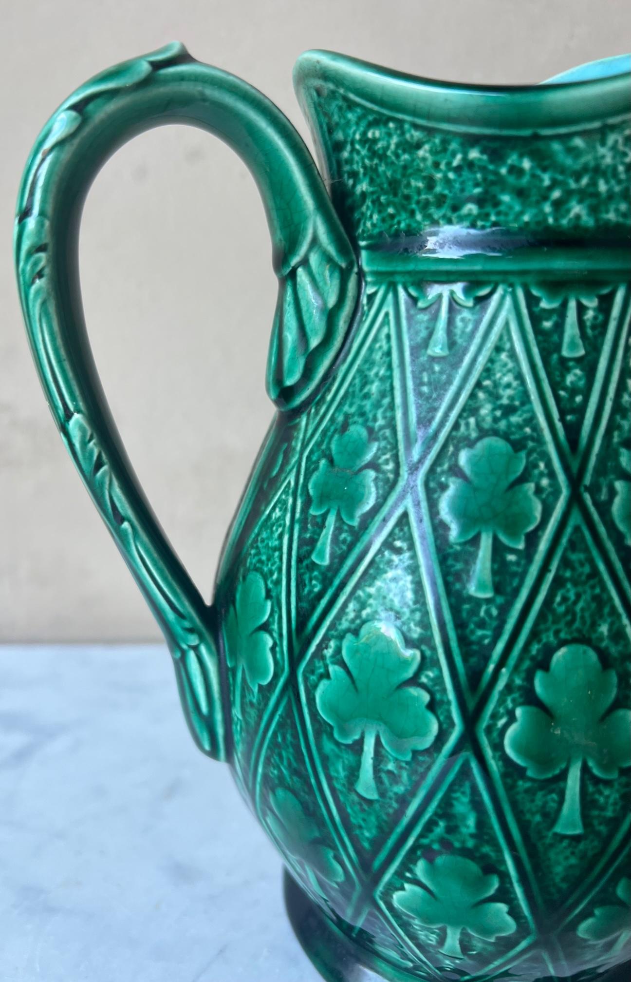 Vibrant green antique French majolica pitcher covered in clovers, made in France between 1875 and 1890. I've never seen another pitcher like this lucky one!