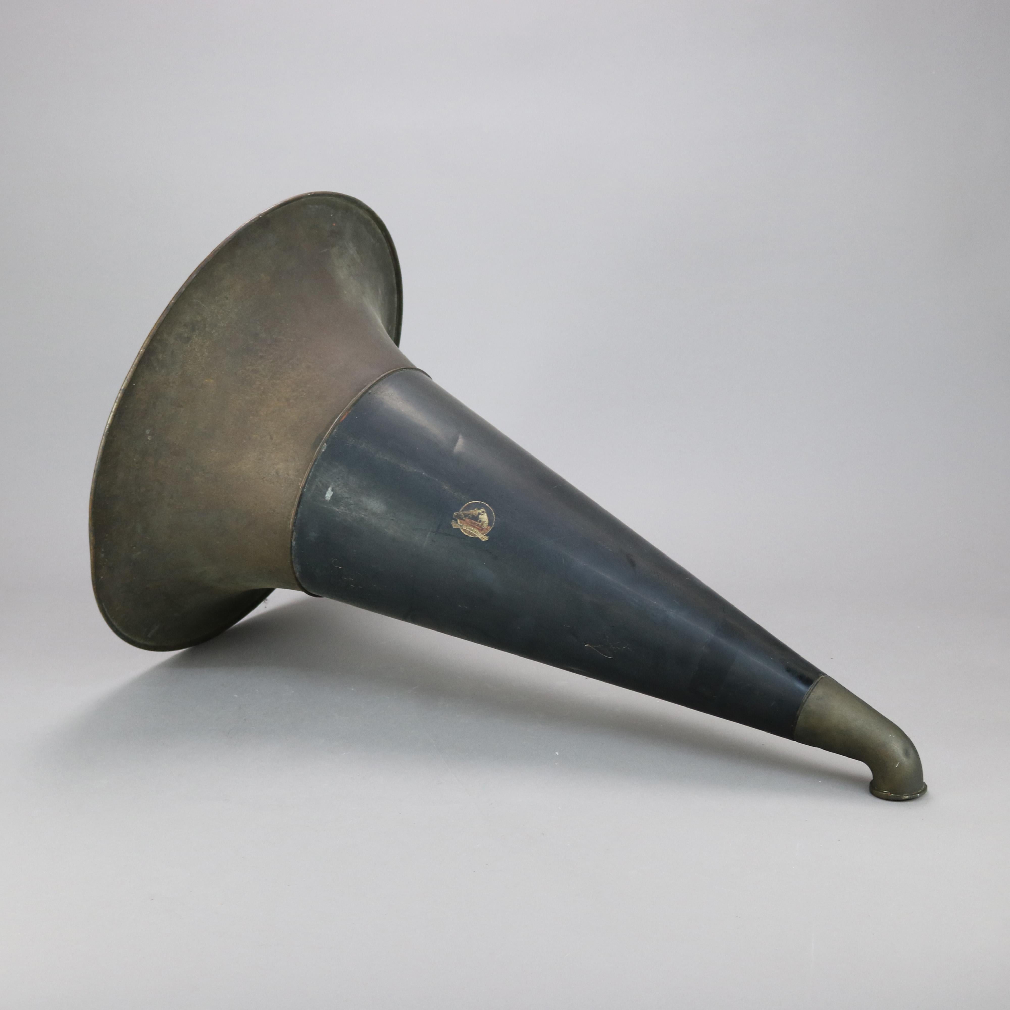 An antique Victor Victrola Phonograph exterior horn offers partially ebonized finish with Victor Talking Machine maker label as photographed, circa 1910

Measures- 18.25'' H x 18.25'' W x 28'' L.