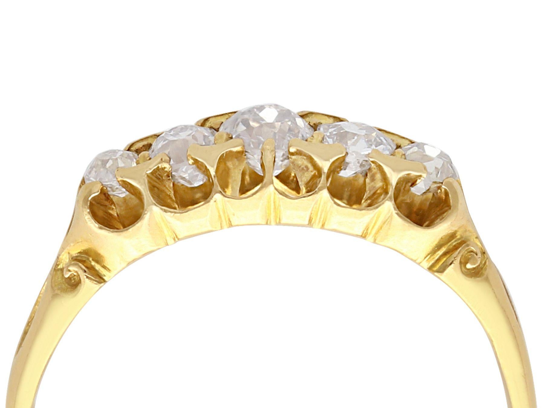 A fine and impressive antique Victorian 0.66 carat diamond and 18 karat yellow gold, five stone ring; part of our antique jewelry and estate jewelry collections

This fine and impressive antique five stone diamond ring has been crafted in 18k yellow