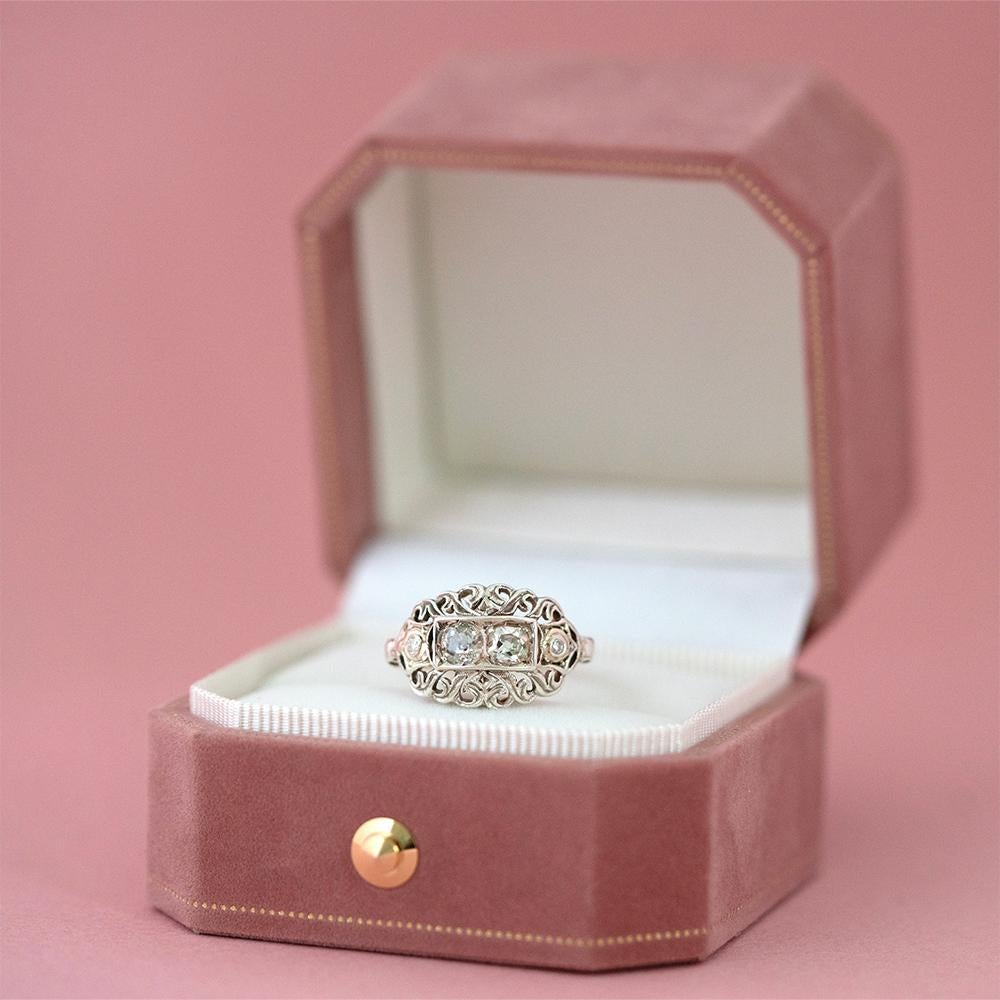 This timeless antique Victorian ring is crafted from 14ct yellow and white gold, featuring a unique ornate design with 0.70ct of Old European and Old Mine cut diamonds. With its antique style and orante craftsmanship, this ring is sure to become a