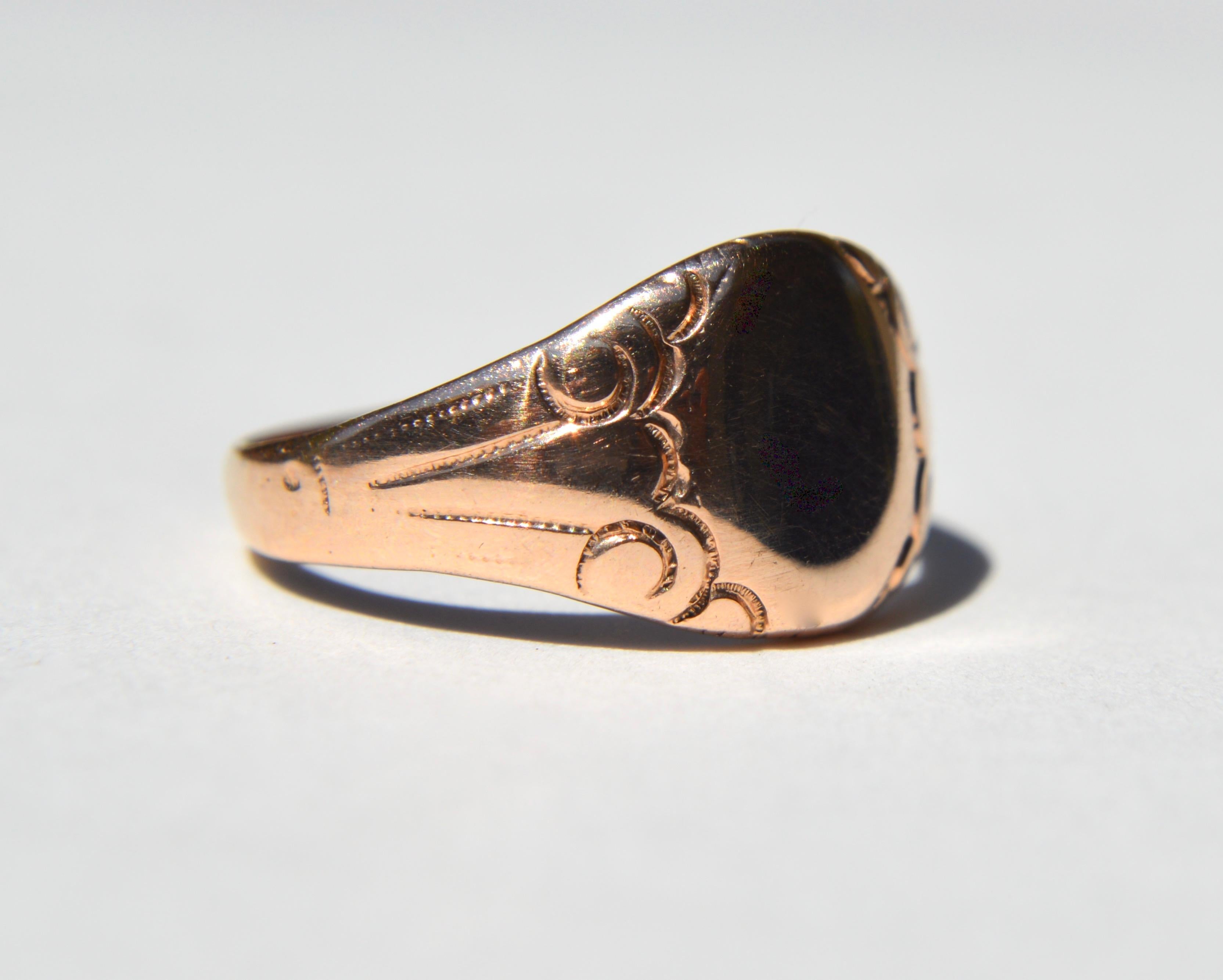 Beautiful antique Victorian era circa late 1880s 10K rose gold signet ring with delicate etched scrolling. Size 5, can be resized by a jeweler. Gold marks have been covered by a small piece of gold at some point in time. Ring has been acid tested as