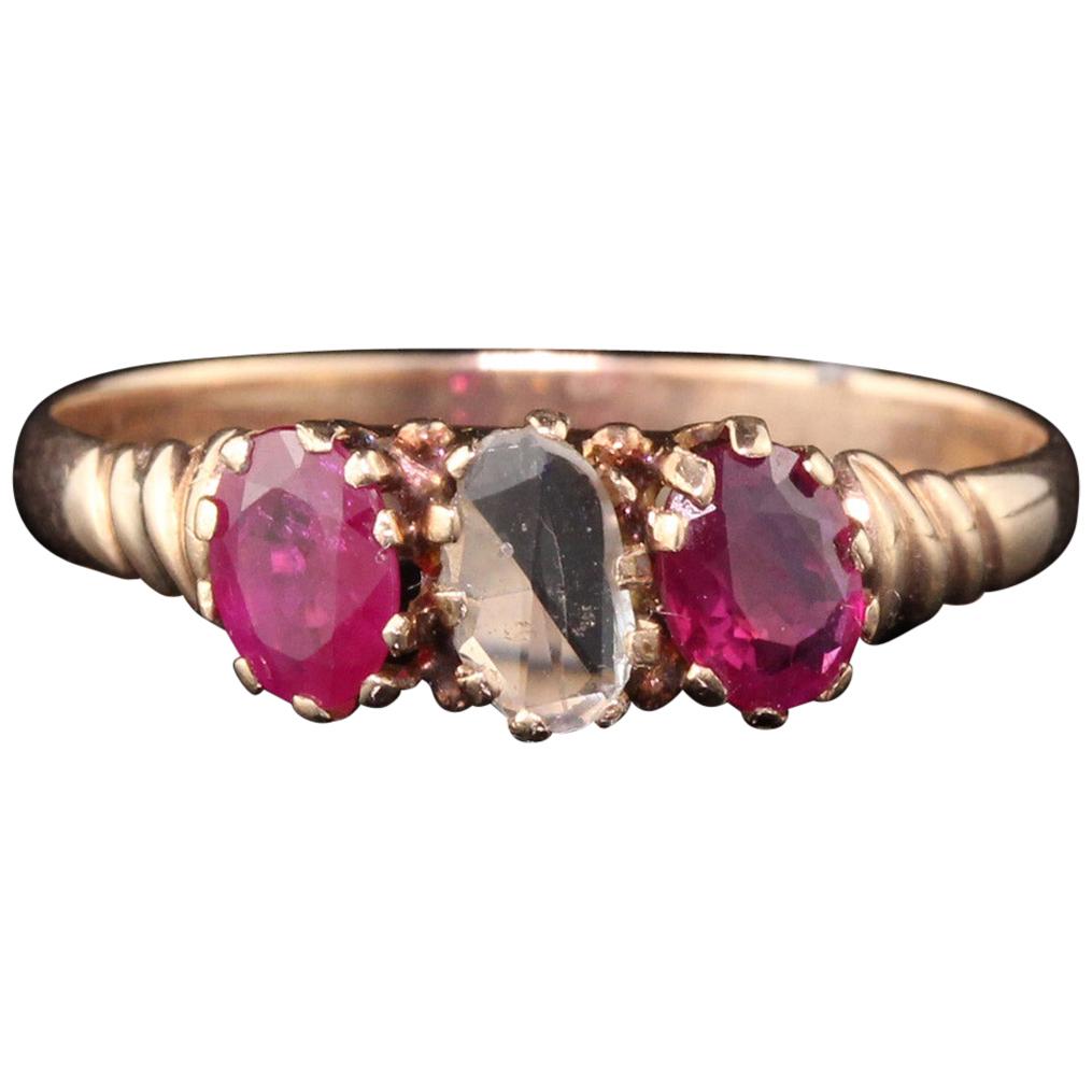 Antique Victorian 10 Karat Rose Gold Rose Cut Diamond and Ruby 3-Stone Ring For Sale