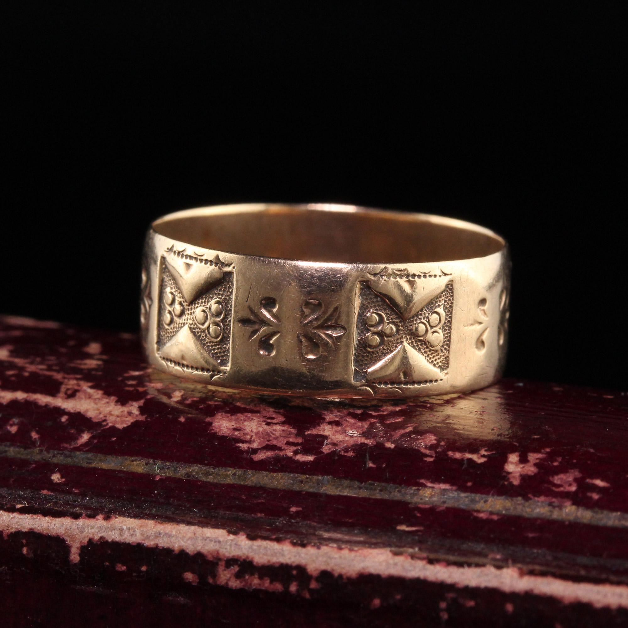 Beautiful Antique Victorian 10K Yellow Gold Engraved Wide Band Wedding Ring. This beautiful wedding band is crafted in 10k yellow gold. The ring is engraved all around the ring and is in great condition. It sits very low on the finger and is