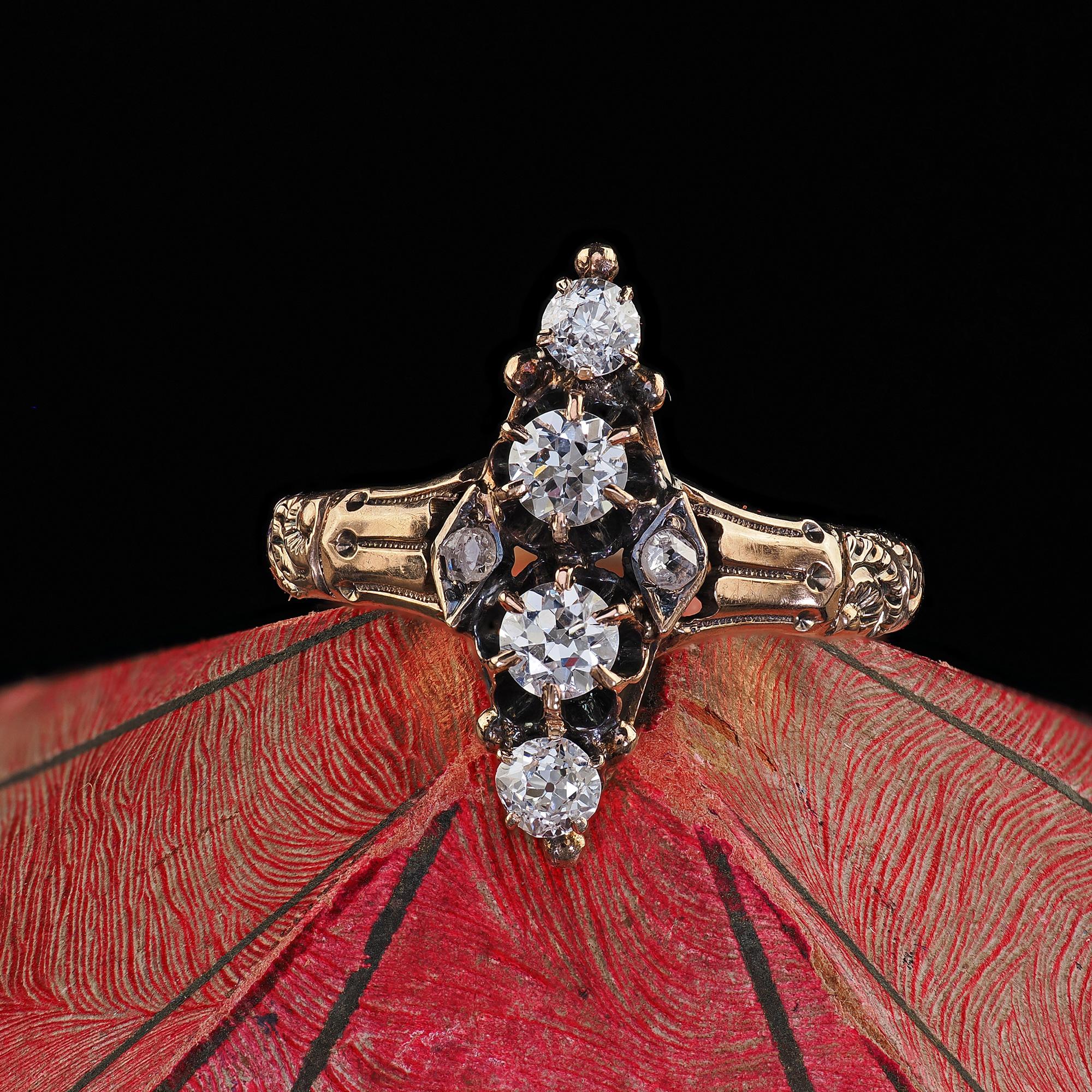 Beautiful Antique Victorian 10K Yellow Gold Old Cut Diamond Engraved Ring. This beautiful Victorian old cut diamond ring is crafted in 10k yellow gold. The ring features four old cut diamonds down the center and a rose cut on either side. The ring