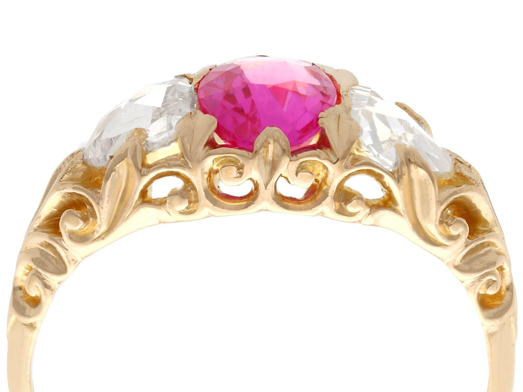 A stunning, fine and impressive antique Victorian 1.28 carat Burmese pink sapphire and 0.76 carat diamond, 22 karat yellow gold trilogy ring; part of our diverse antique jewelry collections.

This stunning, fine and impressive antique oval cut pink