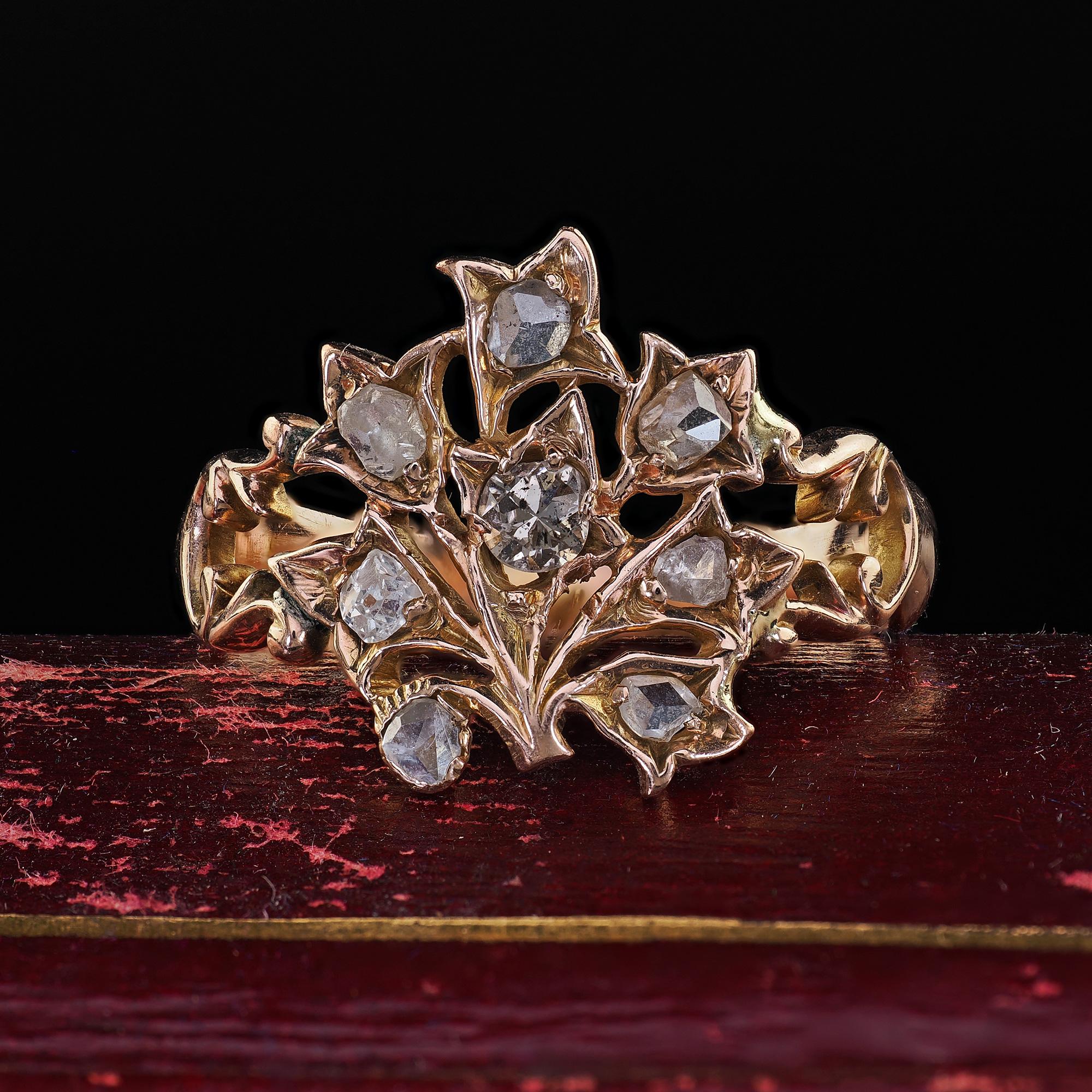 Beautiful Antique Victorian 12K Rose Gold Old Cut Diamond Floral Cocktail Ring. This gorgeous Victorian old cut diamond floral ring is crafted in 12k rose gold. The ring features rose cut and old cut diamonds set throughout the top of the ring. The