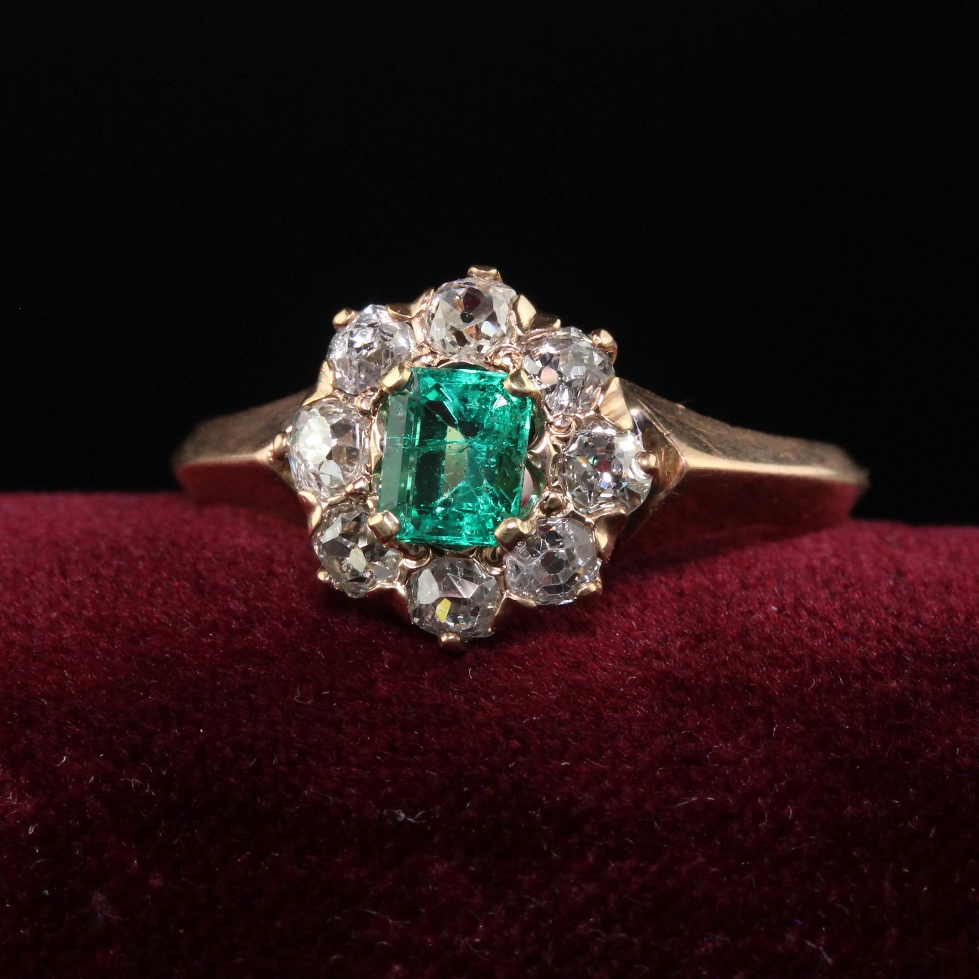 Beautiful Antique Victorian 12K Rose Gold Old Mine Diamond Emerald Engagement Ring . This gorgeous Victorian diamond and emerald ring is crafted in 12k rose gold. This ring features a gorgeous Colombian emerald in the center and is surrounded by old