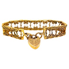 Antikes viktorianisches 12K Gelbgold Schnörkelarmband Herz- Padlock-Armband.
