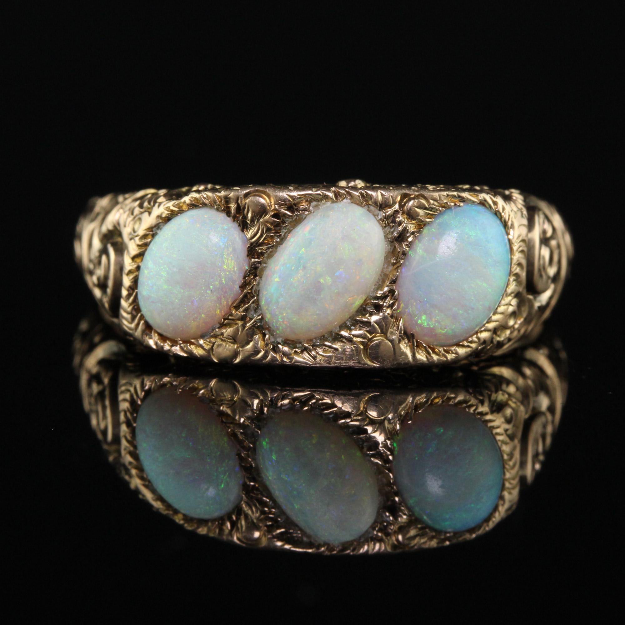 Cabochon Antique Victorian 12k Yellow Gold Three Stone Opal Engraved Cocktail Ring For Sale
