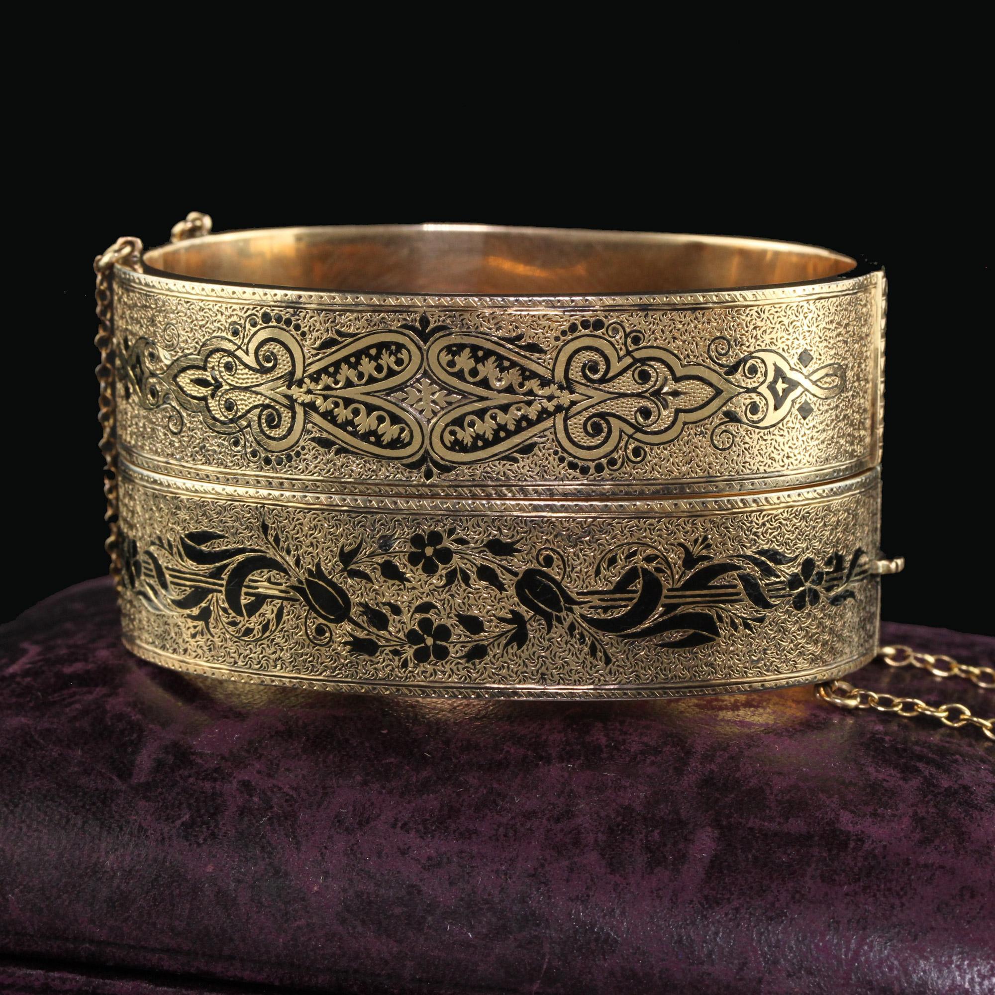 Beautiful Antique Victorian 12K Yellow Gold Wide Engraved Enamel Wedding Bangle Bracelet Set. This beautiful set of Victorian bangles are crafted in 12k yellow gold. The bangle bracelets have gorgeous engravings on the top going around the entire