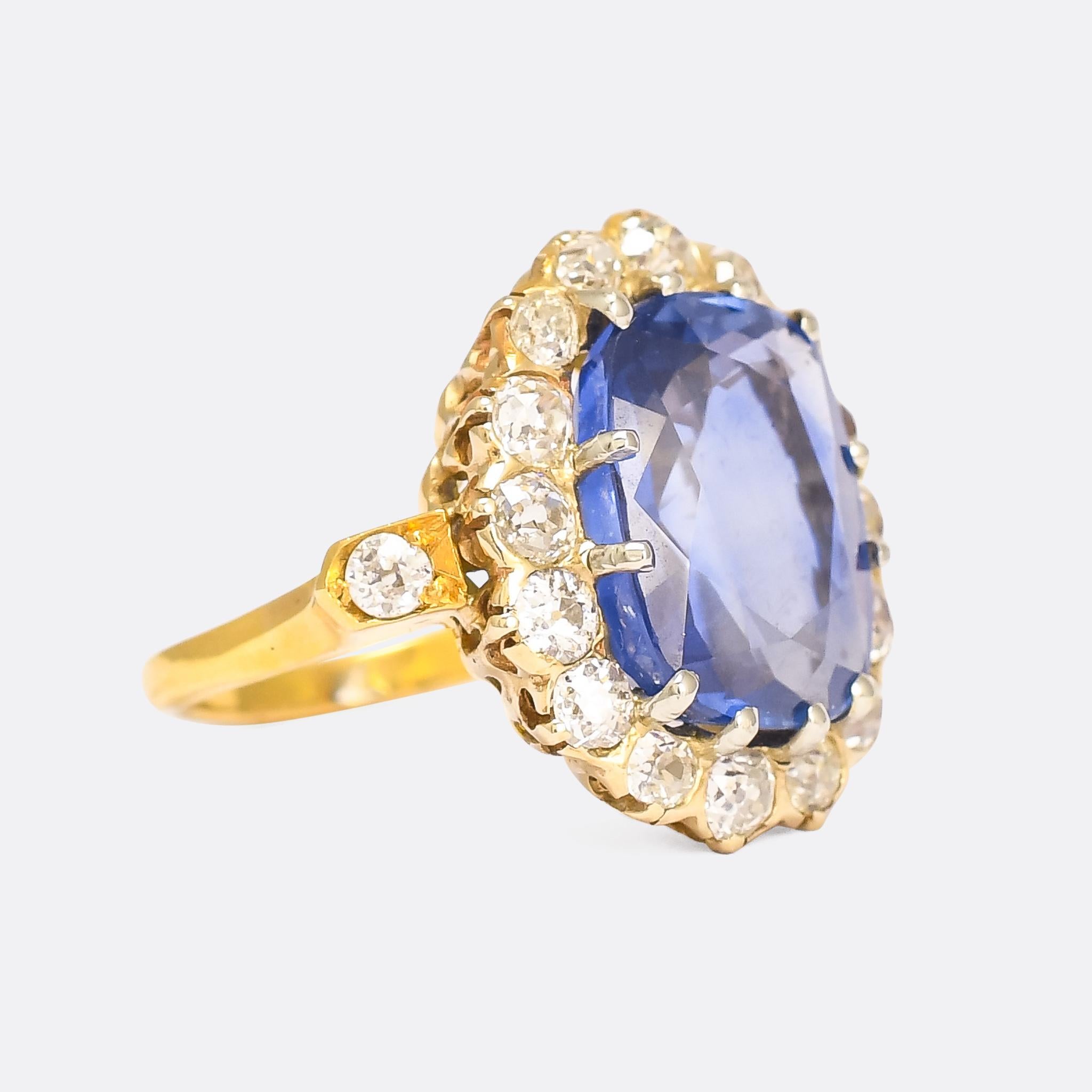 DESCRIPTION

Late Victorian, c.1900

Hello 13.5ct Burma no heat sapphire... An outstanding antique cluster ring dating from the early 20th Century, and set with the most incredible cornflower blue sapphire we've ever had the privilege of owning.