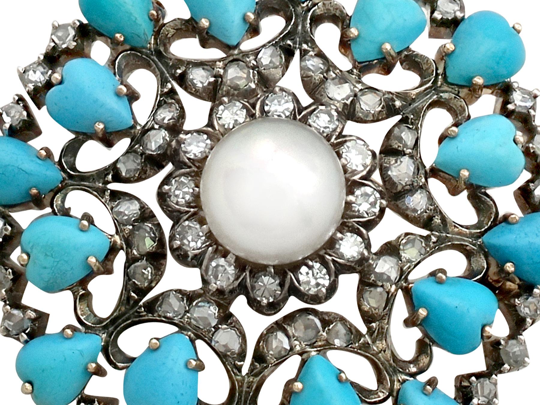 An exceptional Victorian 1.36 carat diamond, pearl and turquoise 18k yellow gold brooch; part of our antique jewelry/estate jewelry collections.

This impressive antique turquoise brooch has been crafted in 18k yellow gold with a silver