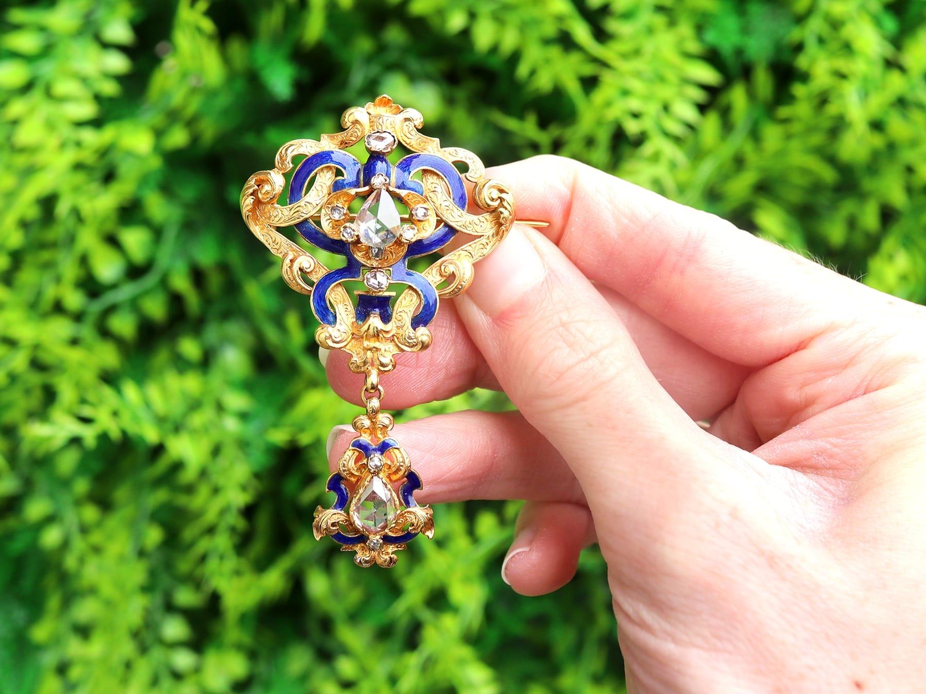 A stunning, fine and impressive, large antique Victorian 1.38 carat diamond, enamel and 21 karat yellow gold brooch; part of our diverse antique Victorian brooch collections.

This stunning, fine and impressive antique brooch has been crafted in 21k