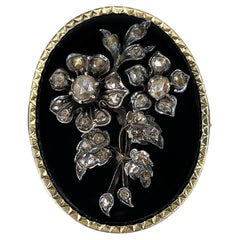 Antique Victorian 14 Karat Gold Black Onyx Rose Cut Diamond Floral Oval Brooch