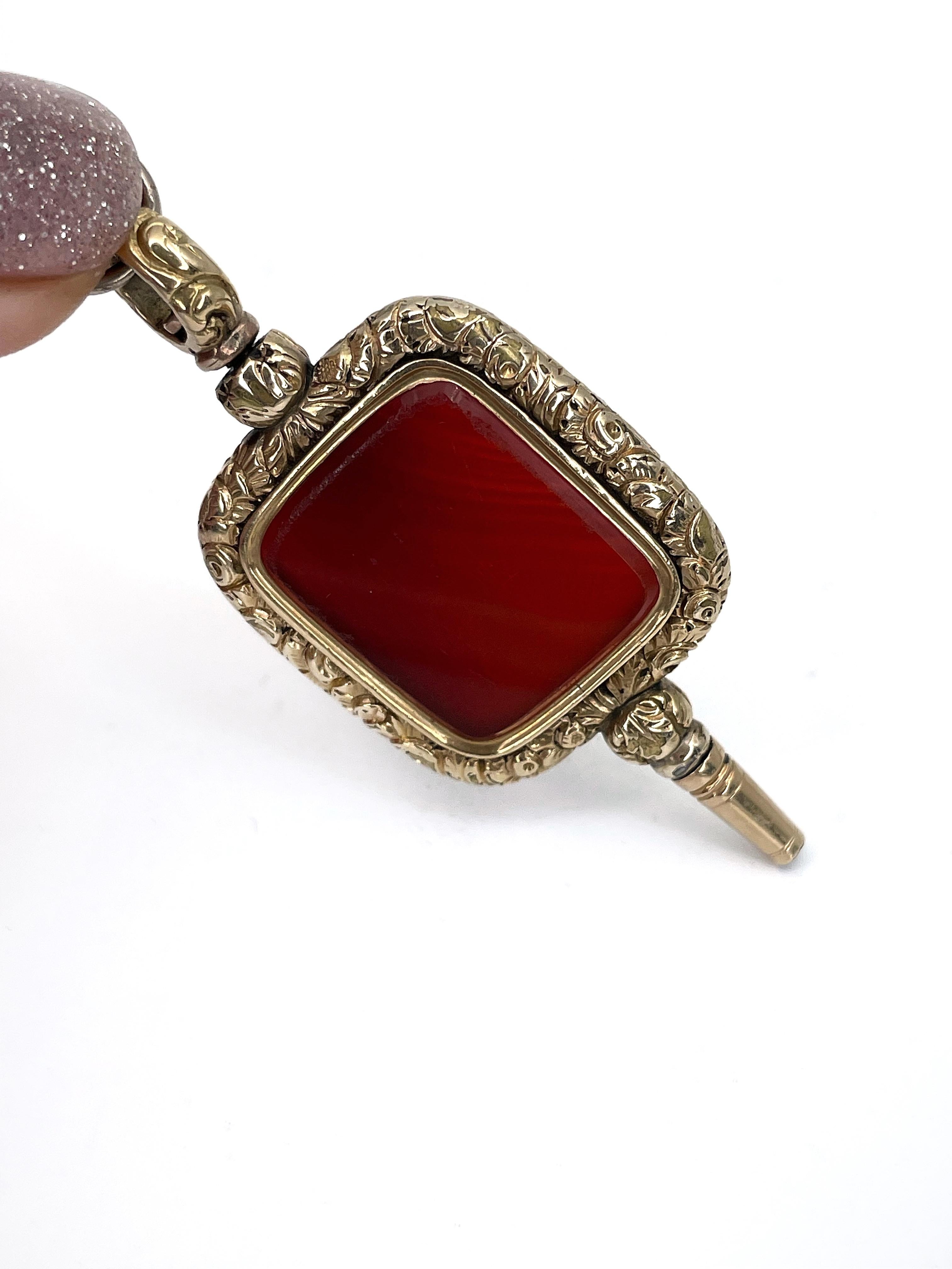 It is a lovely Victorian pocket watch key fob charm pendant crafted in base metal and adorned with gold. It features rectangle carnelian which is set in highly ornamented frames. 

Weight: 14g
Size: 6x2.5cm

———

If you have any questions, please
