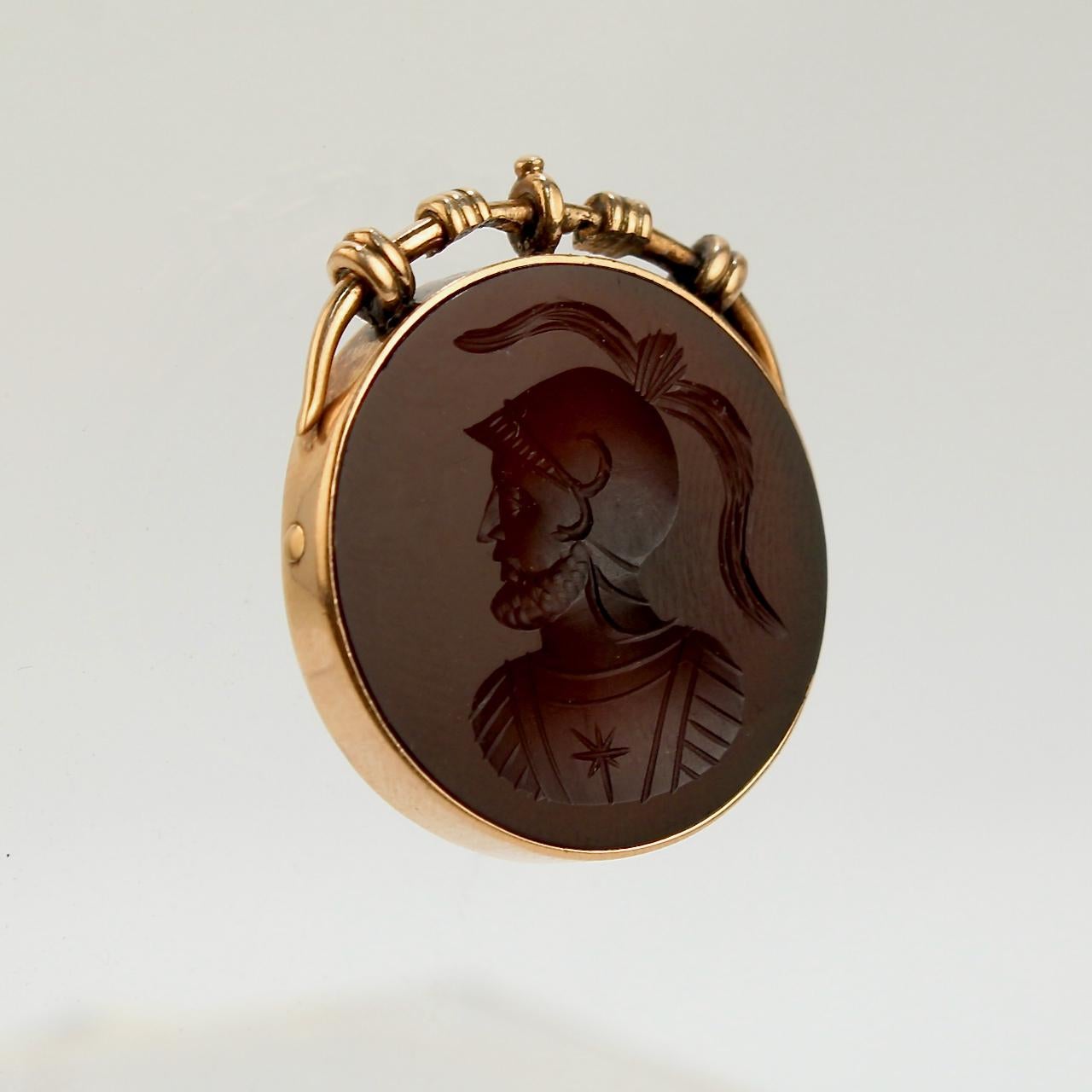 A very fine Victorian carnelian and gold pendant or charm.

With a carved intaglio of an ancient Roman soldier set in 14 karat gold.

Simply a fine piece!

Date:
19th Century

Overall Condition:
It is in overall good, as-pictured, used estate