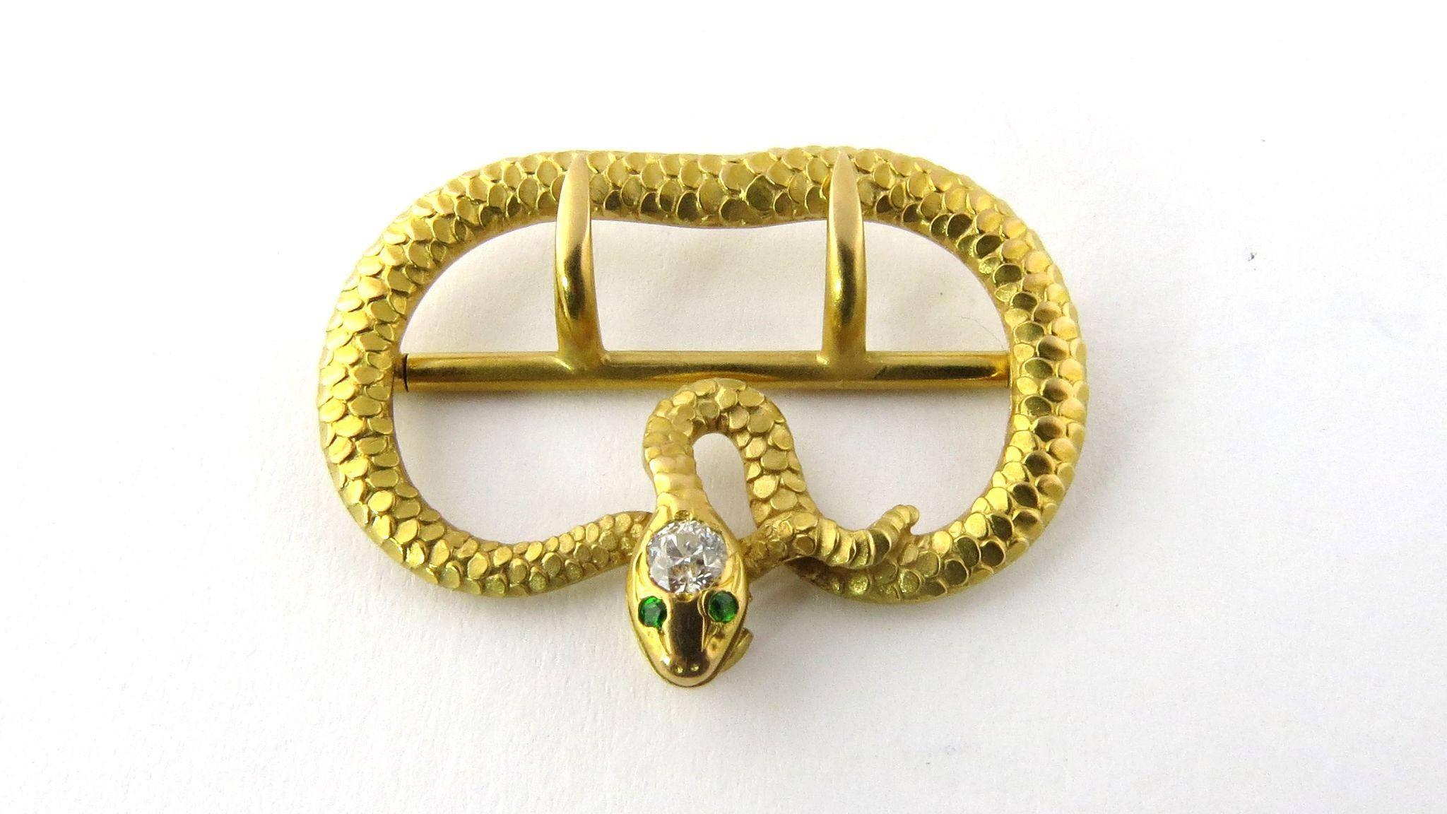 Antique Victorian 14K Yellow Gold Diamond and Emerald Snake Belt or Sash / Scarf Buckle. 

Beautiful scales adorn this snake from tail to diamond head finishing with emerald eyes. 

Marked: 14K 

Measures: 1 1/4