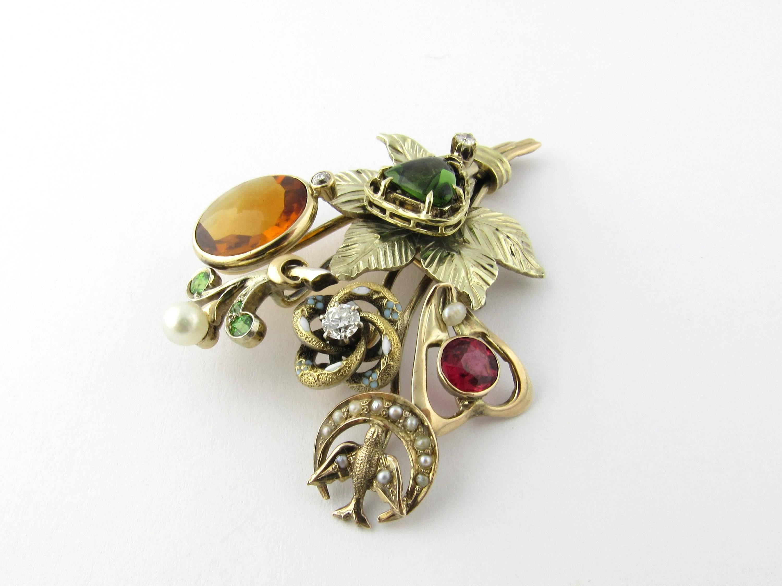 Antique Victorian 14 Karat Yellow Gold Diamond, Gemstone and Pearl Hatpin Brooch- 
This stunning Victorian brooch features a lovely bouquet of flowers detailed with red, green and yellow gemstones, three European cut diamonds and seed pearls set in