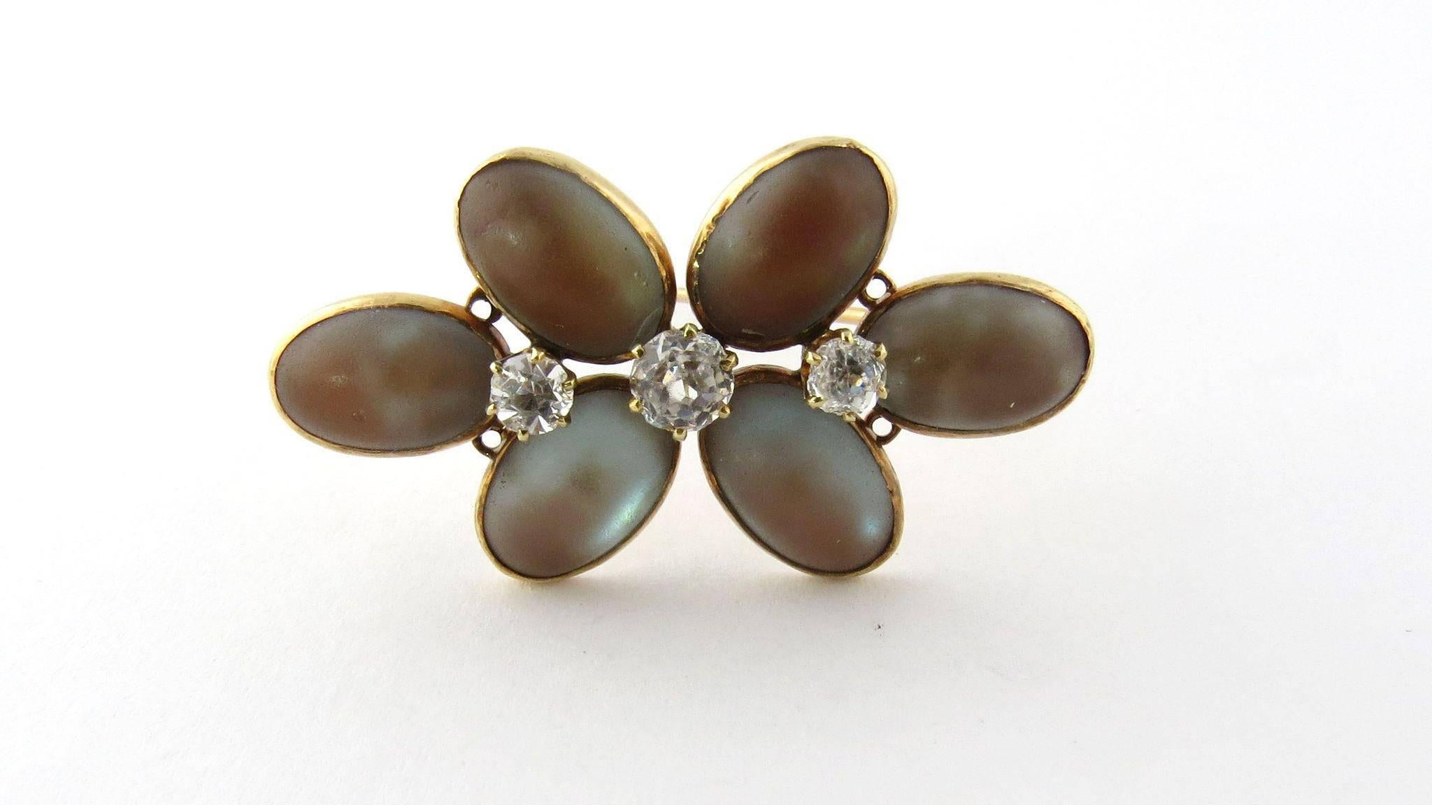 Victorian 14K Yellow Gold Saphrite and Spinel Flower Brooch Pin. 

Bezel set saphrites surround 3 spinel flower centers in this well crafted antique brooch. 

Measures: 41mm x 23mm. 
Weighs 9.3g, 5.95dwt 
Sits 7mm high. 
Acid tested for purity and