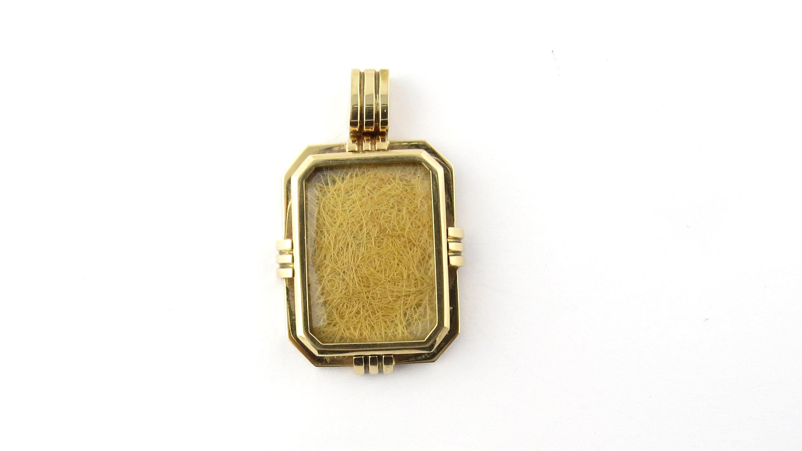 Antique Victorian 14 Karat Yellow Gold Mourning Hair Locket- 
This exceptional Victorian mourning locket includes lock of hair visible through its glass front. Beautifully detailed in 14K yellow gold. 
Size: 40 mm x 26 mm 
Weight: 9.4 dwt. / 14.7