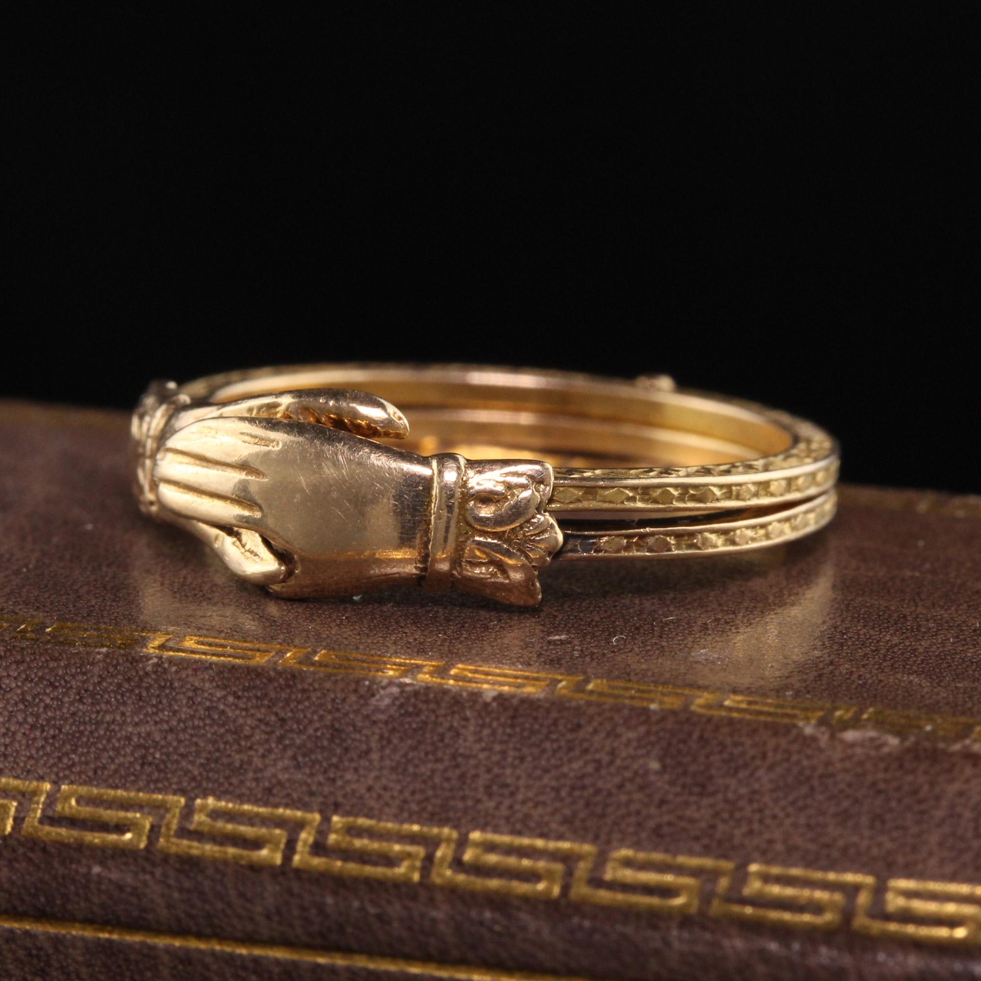 Beautiful Antique Victorian 14K/10K Yellow Gold Engraved Fede Hands Ring. This pristine fede ring has nice deep engravings on both rings around both bands. The ring is marked 10K bust tests as 14K. We believe the hands are 10K while the rings